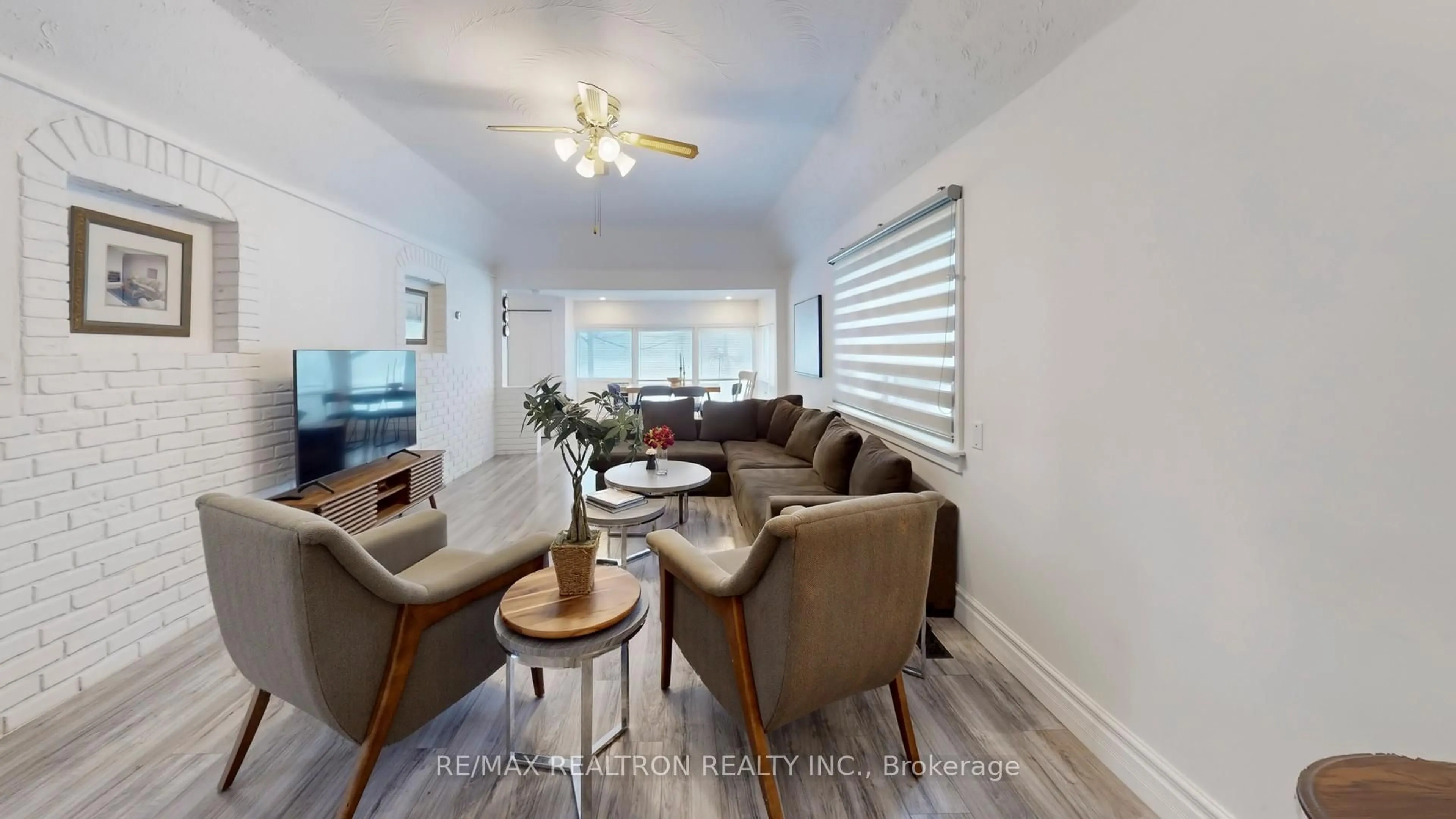 Living room with furniture, wood/laminate floor for 196 Ways Bay Dr, Georgina Ontario L4P 2M7