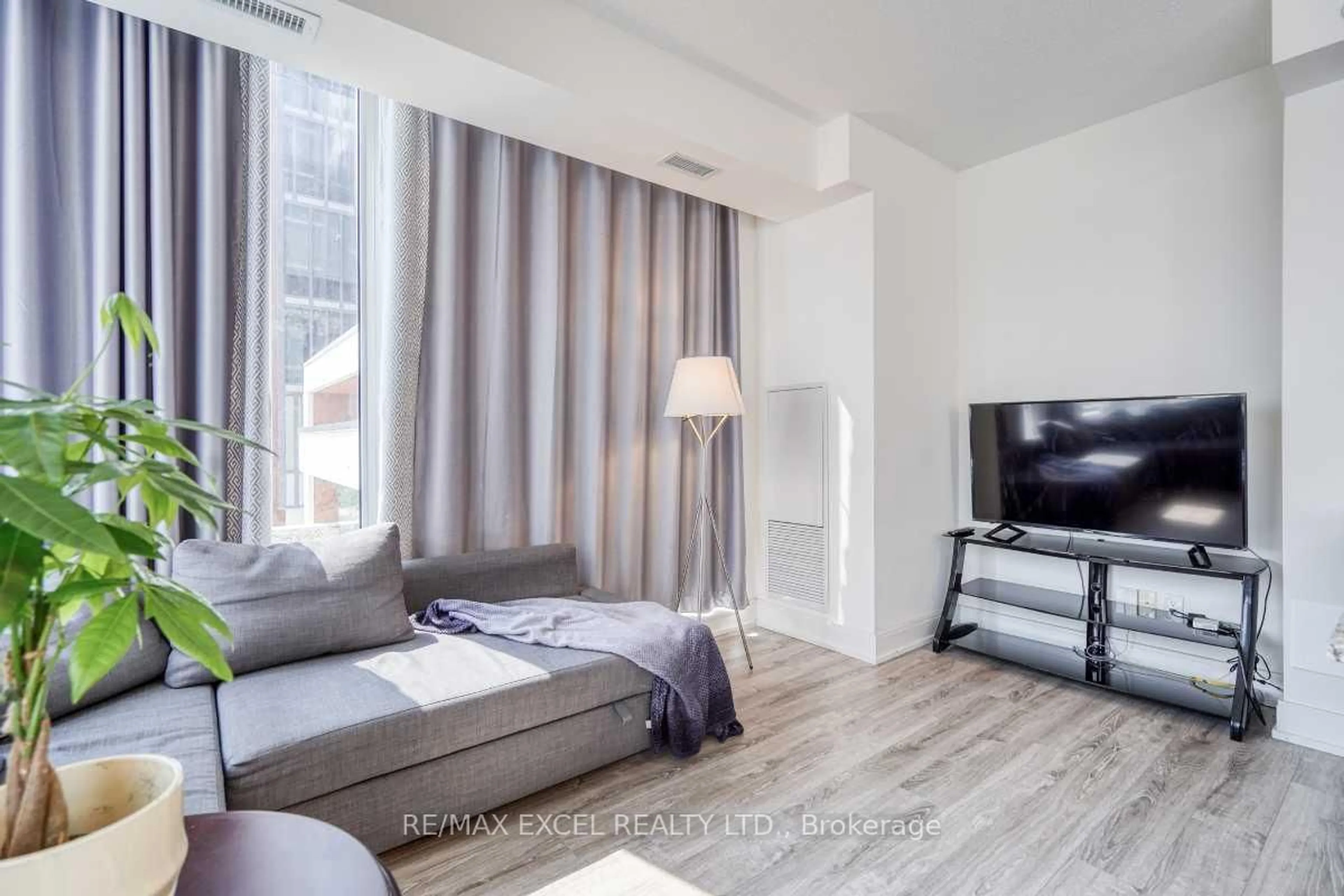 Living room with furniture, unknown for 9608 Yonge St #202A, Richmond Hill Ontario L4C 0X4