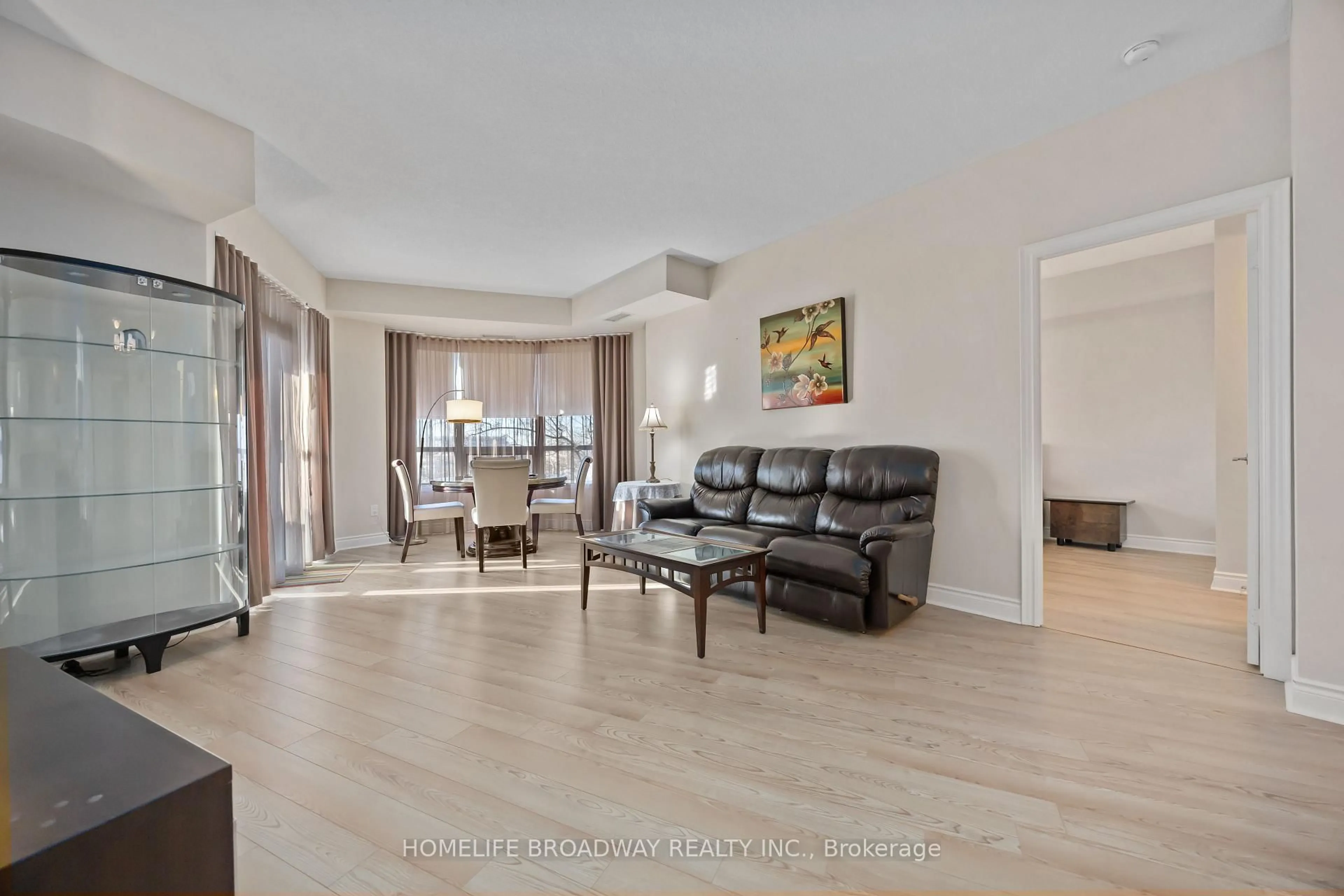 Living room with furniture, unknown for 23 Cox Blvd #263, Markham Ontario L3R 7Z9