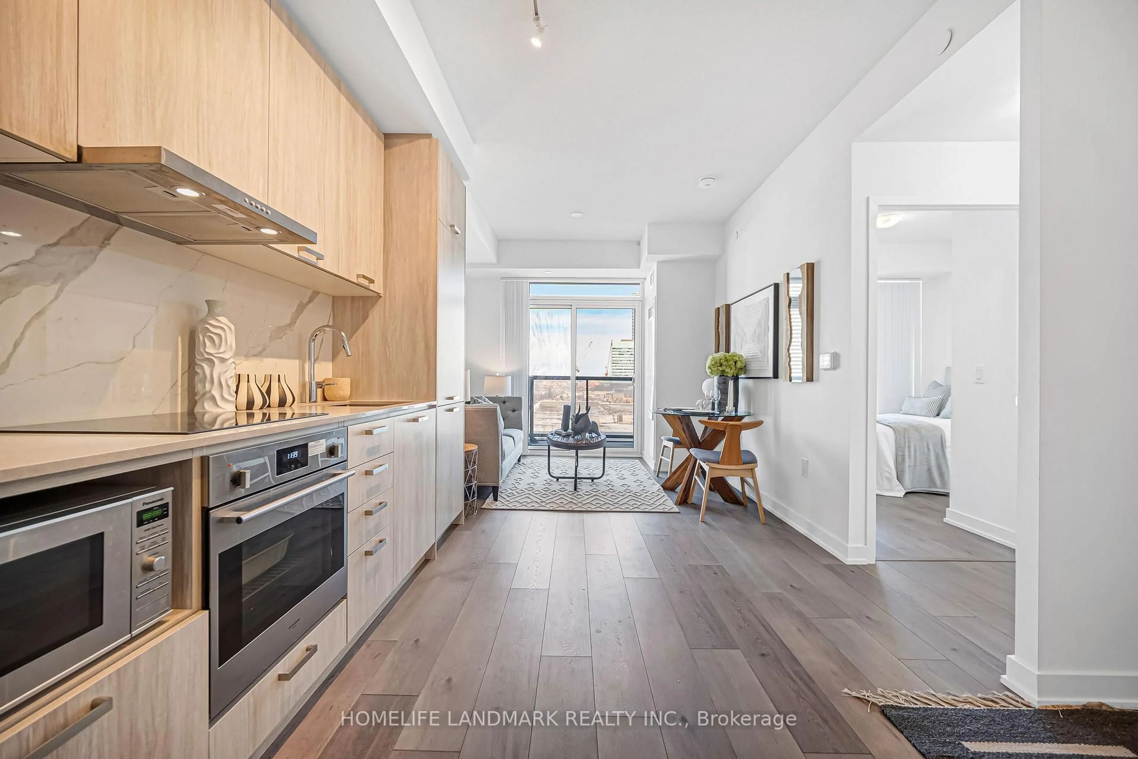 Open concept kitchen, wood/laminate floor for 10 Honeycrisp Cres #622, Vaughan Ontario L4K 0M7