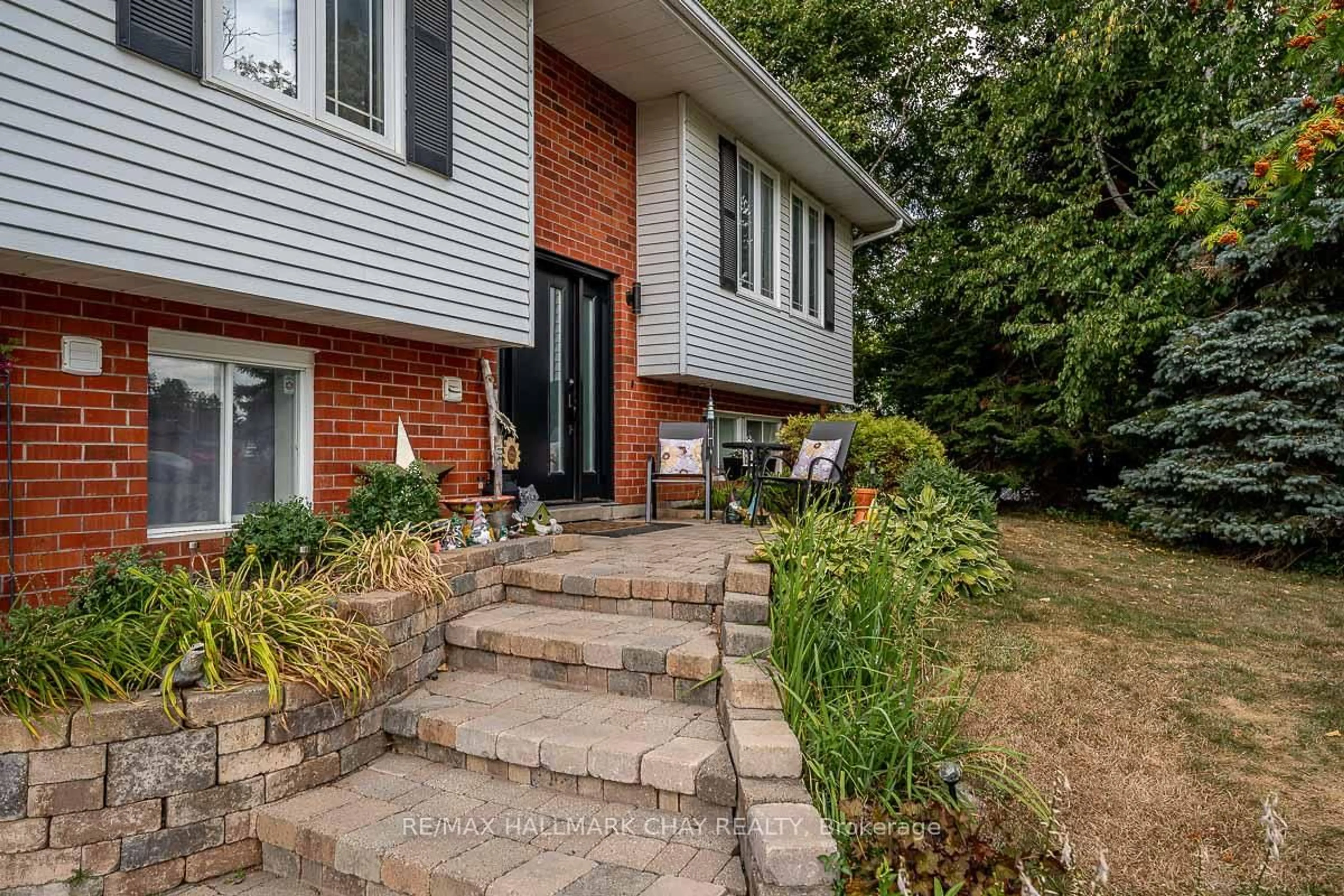 Home with brick exterior material, street for 61 Marshall Cres, Essa Ontario L0M 1B1