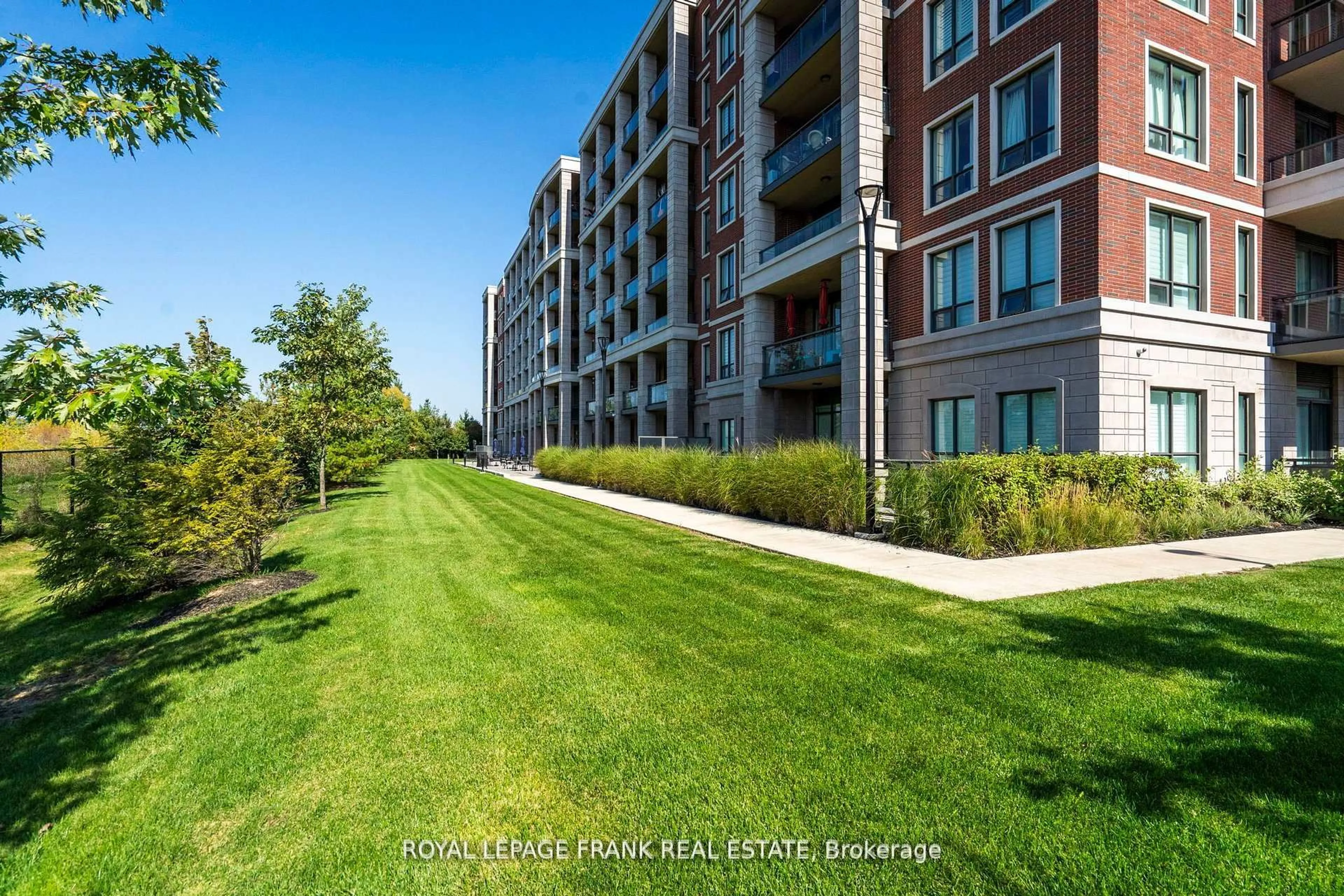 A pic from outside/outdoor area/front of a property/back of a property/a pic from drone, water/lake/river/ocean view for 25 Baker Hill Blvd #712, Whitchurch-Stouffville Ontario L4A 4R5