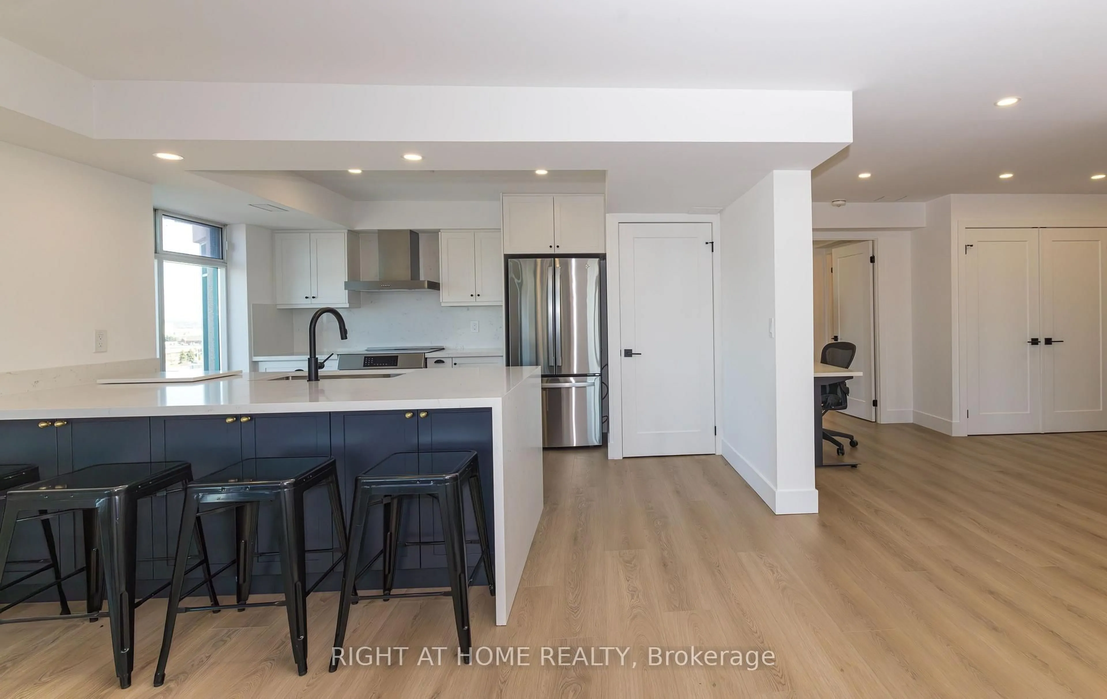 Open concept kitchen, wood/laminate floor for 135 Pond Dr #1508-1509, Markham Ontario L3T 7V6