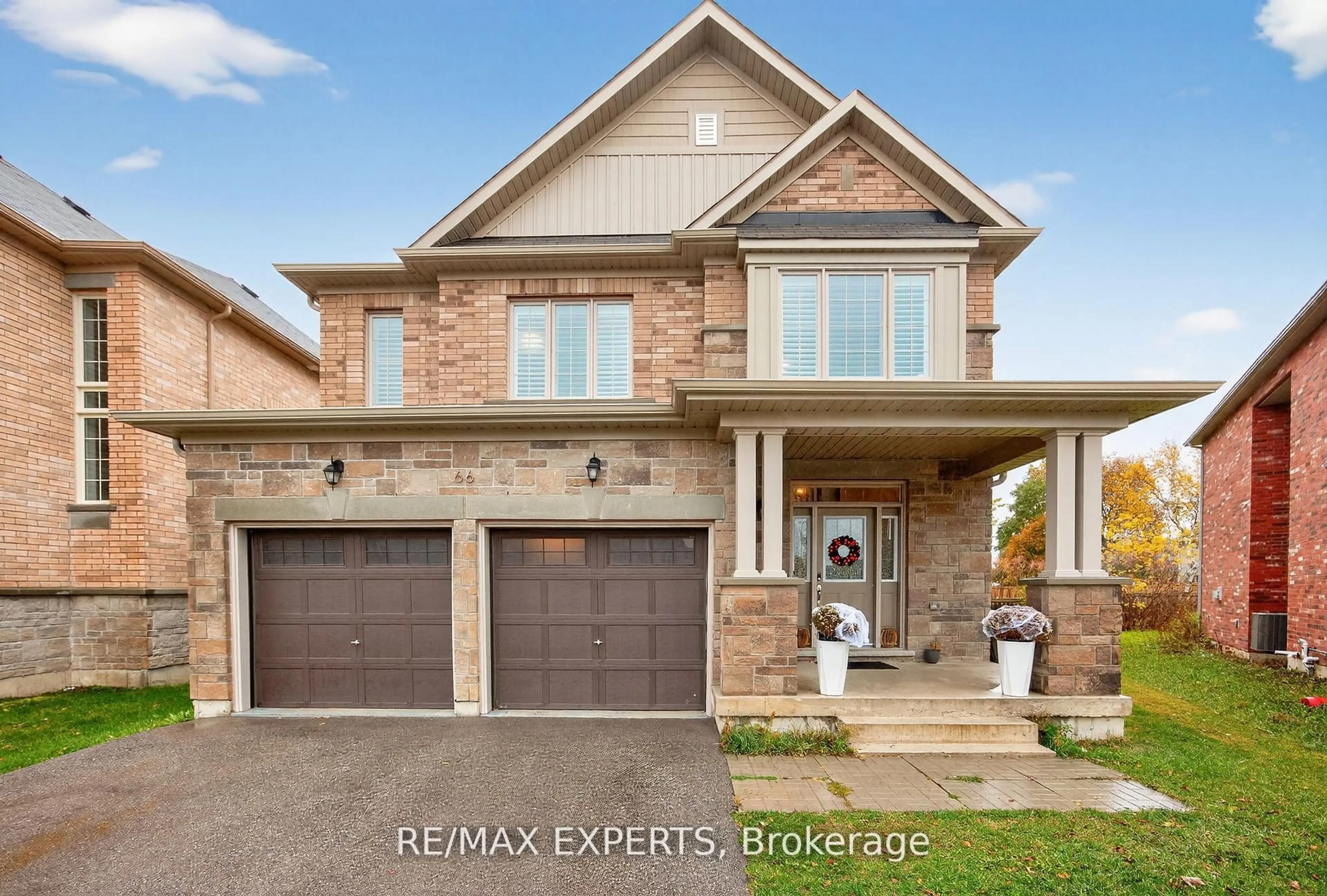 Home with brick exterior material, street for 66 Robb Thompson Rd, East Gwillimbury Ontario L0G 1M0