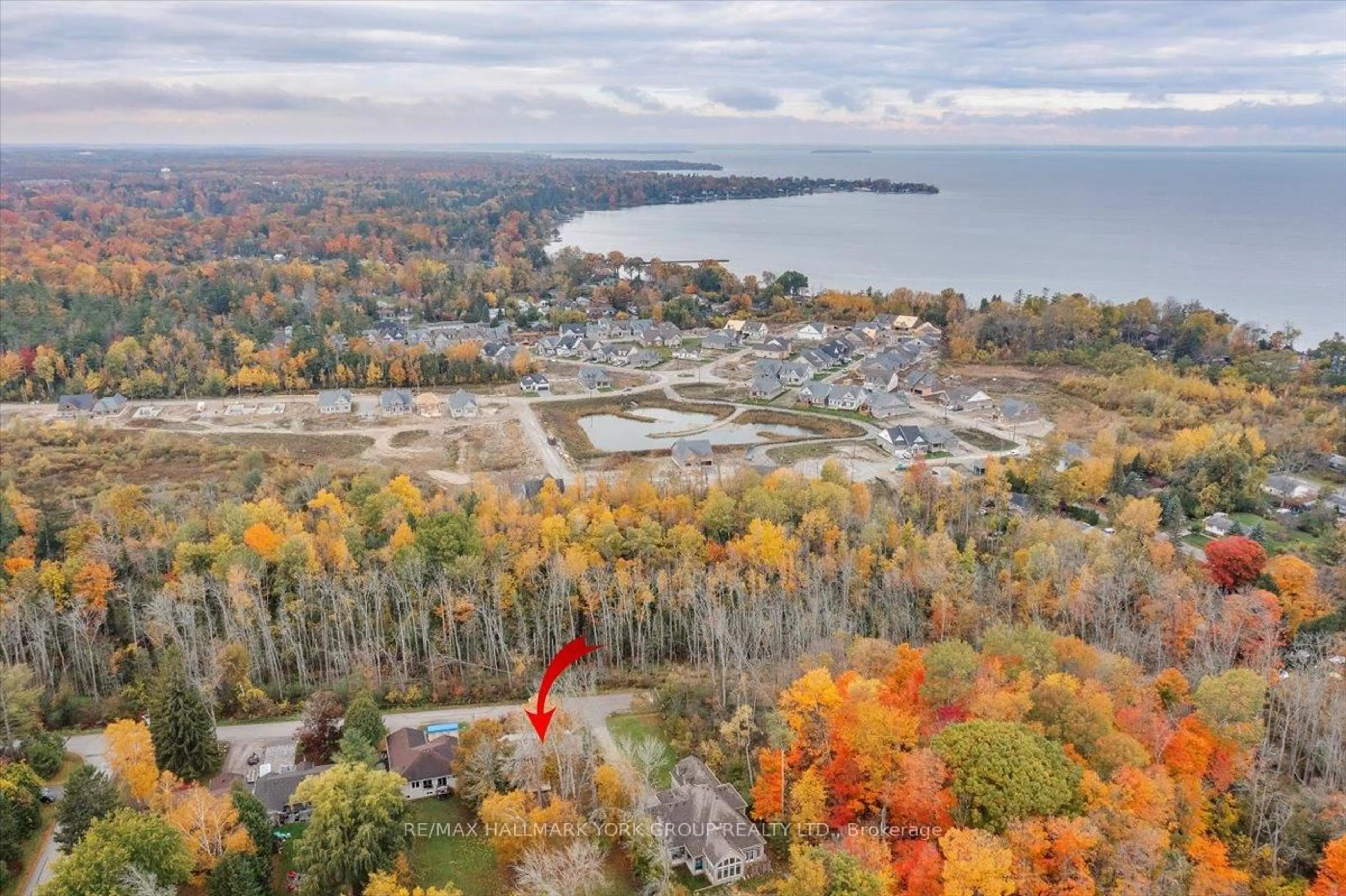 A pic from outside/outdoor area/front of a property/back of a property/a pic from drone, water/lake/river/ocean view for 33 Mourning Dove Rd, Georgina Ontario L0E 1R0