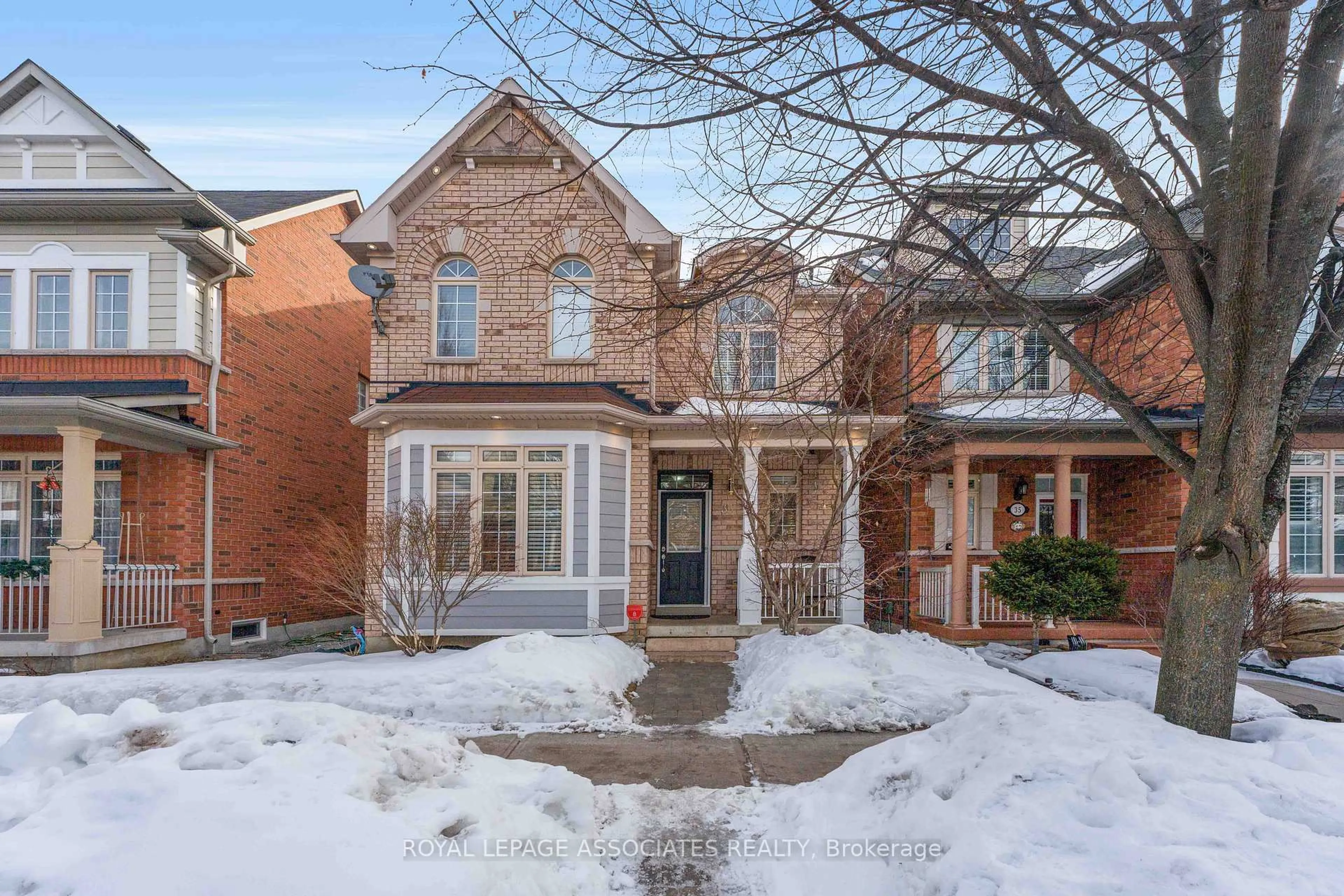 Home with brick exterior material, street for 33 Evaridge Dr, Markham Ontario L6B 1E7