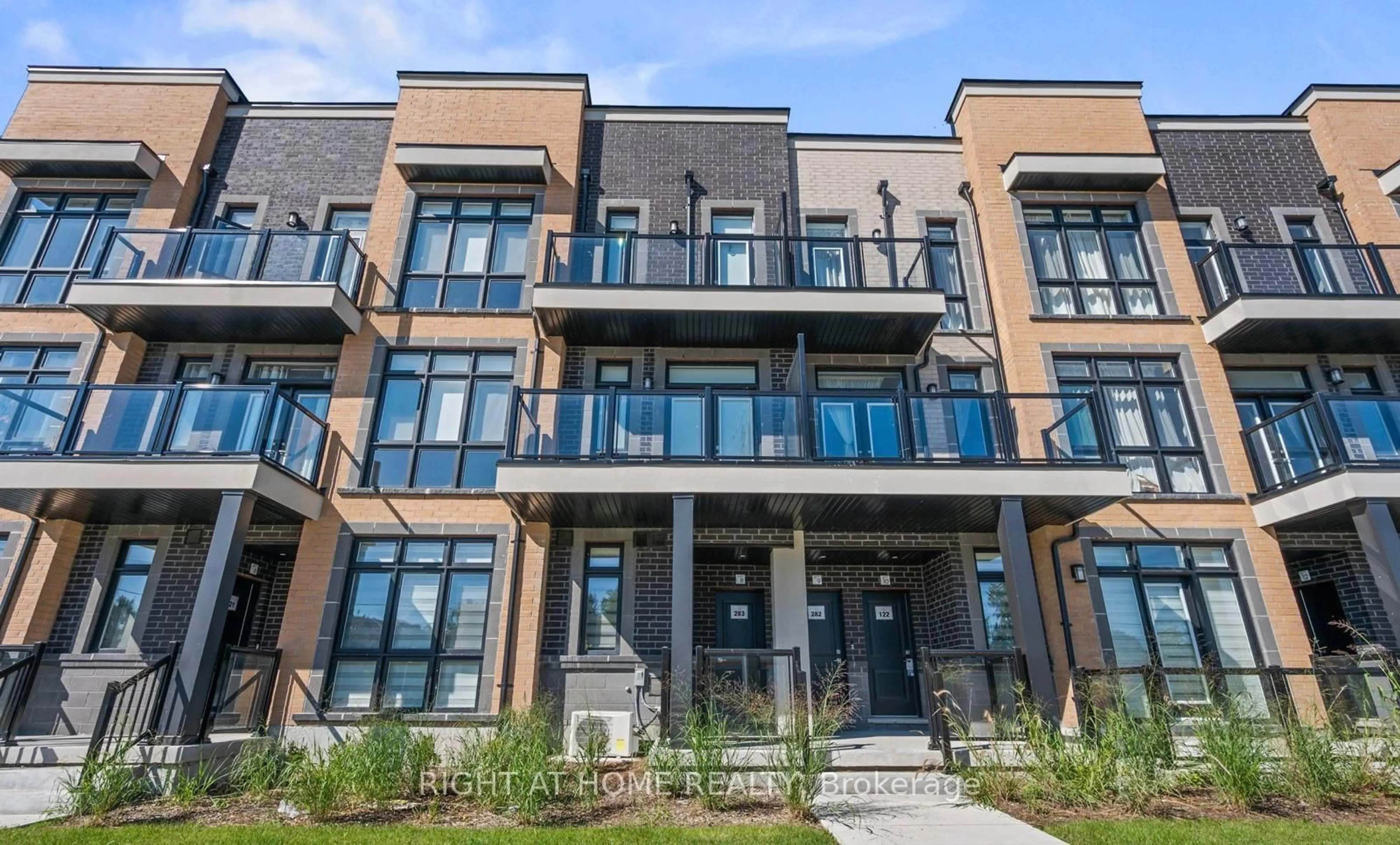 Home with brick exterior material, building for 12860 YONGE St #8, Richmond Hill Ontario L4E 1J4