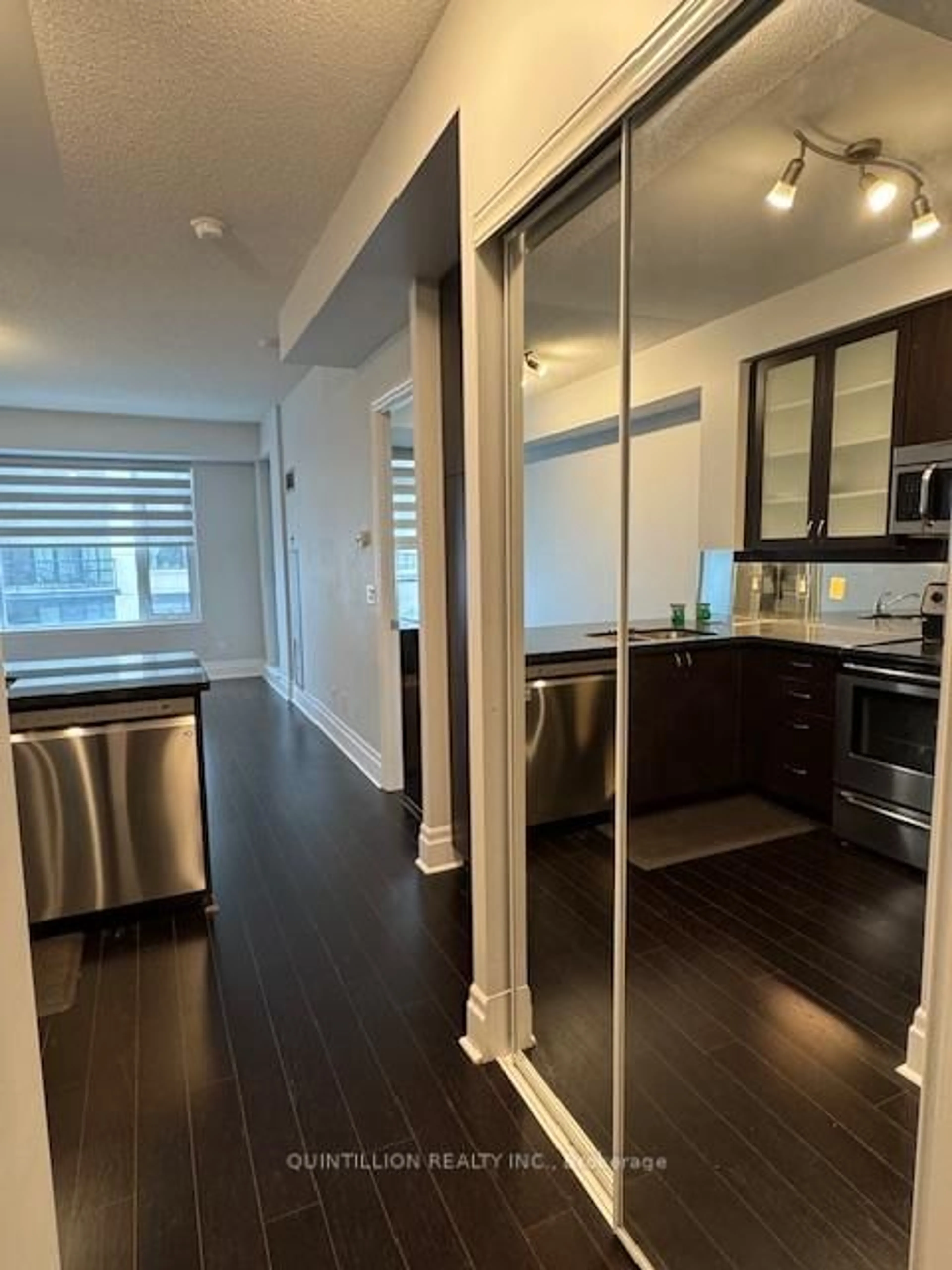 Open concept kitchen, wood/laminate floor for 131 Upper Duke Cres #314, Markham Ontario L6G 0C9