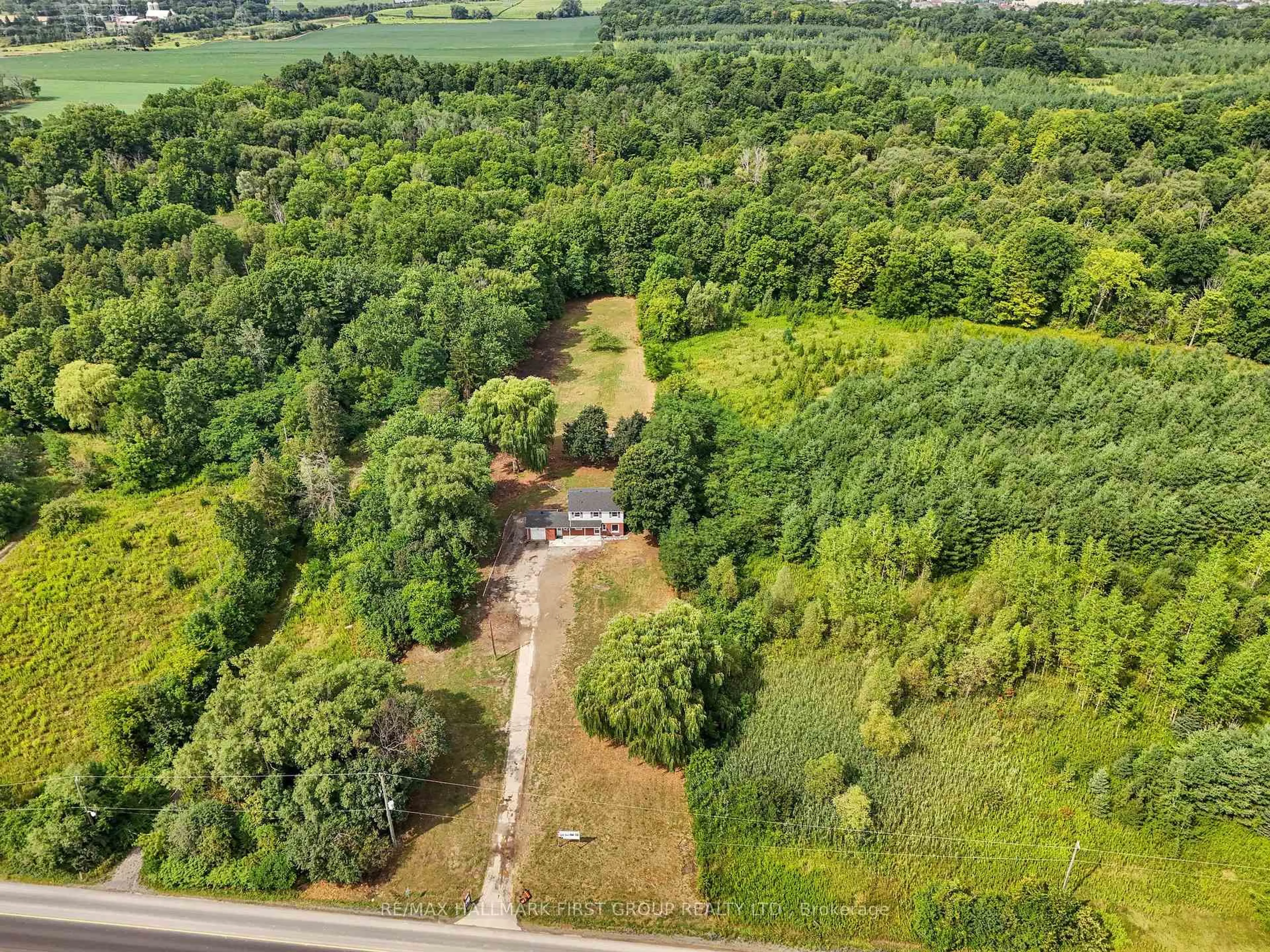A pic from outside/outdoor area/front of a property/back of a property/a pic from drone, forest/trees view for 7300 Reesor Rd, Markham Ontario L6B 1A8
