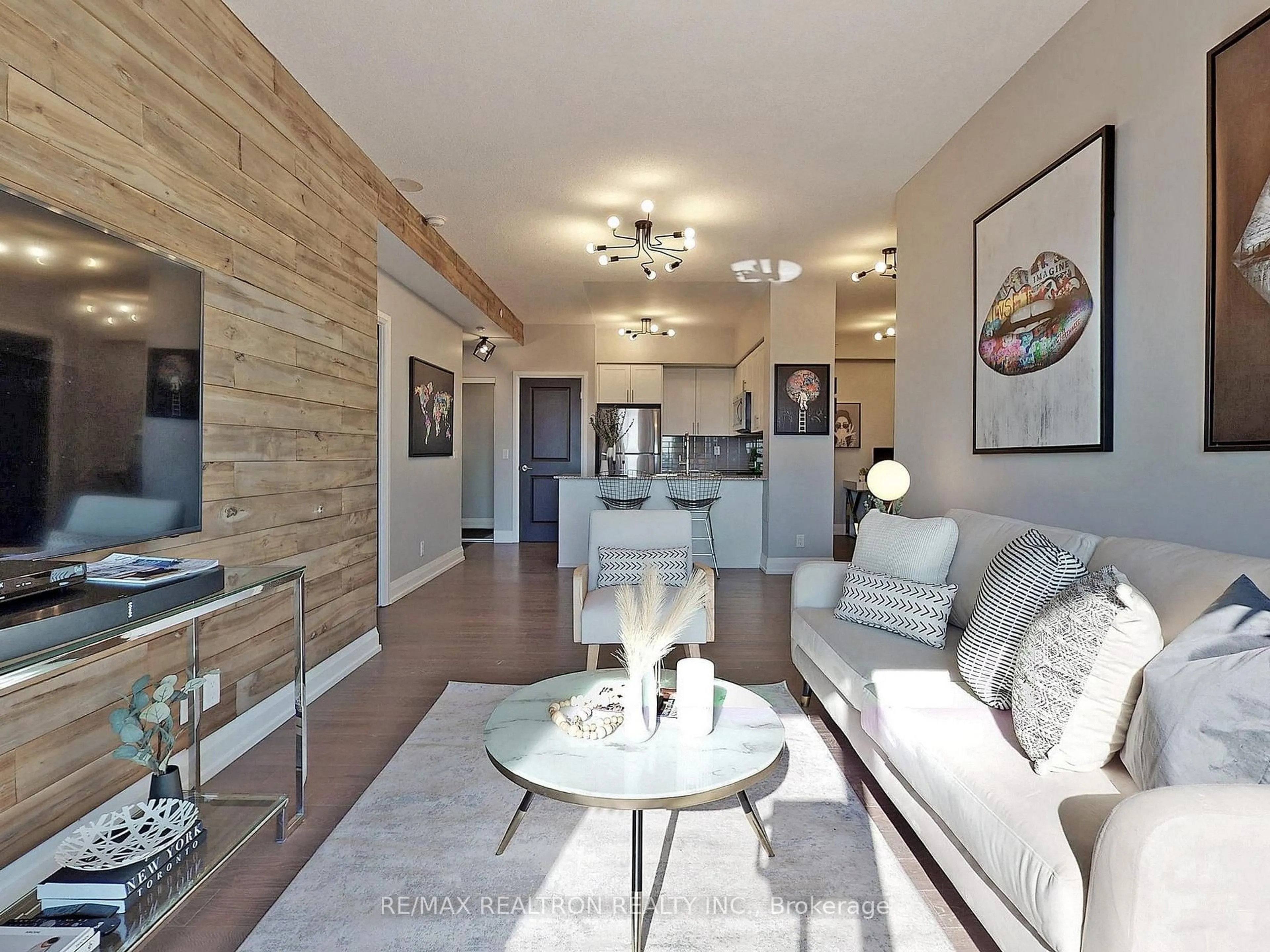 Living room with furniture, wood/laminate floor for 7890 Bathurst St #LPH 2505, Vaughan Ontario L4J 0J8