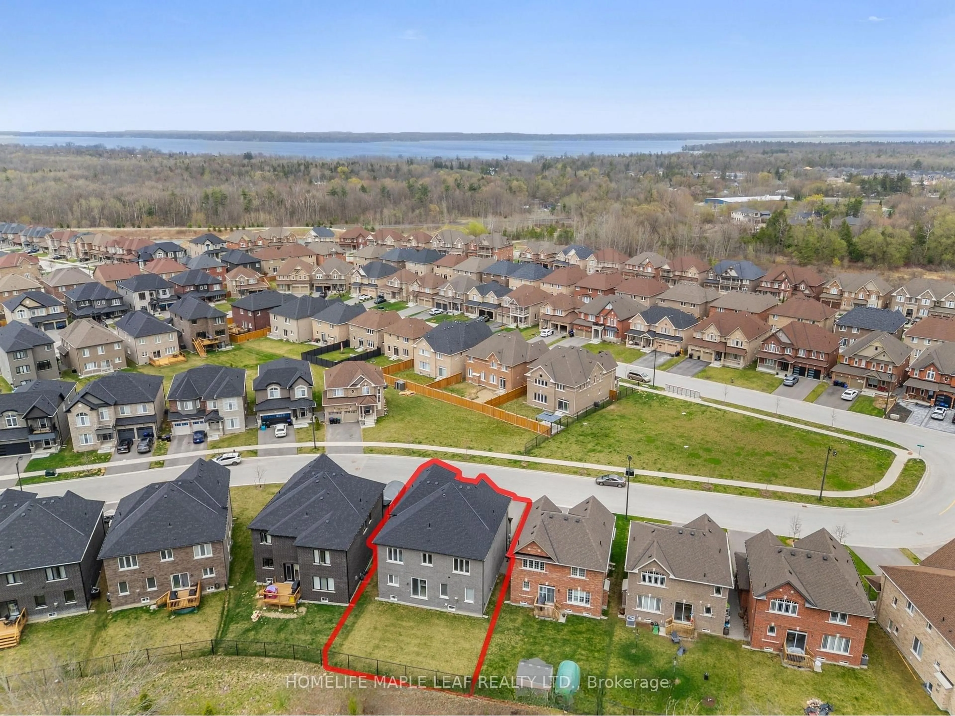 A pic from outside/outdoor area/front of a property/back of a property/a pic from drone, water/lake/river/ocean view for 1028 Hardy Way, Innisfil Ontario L0L 1W0