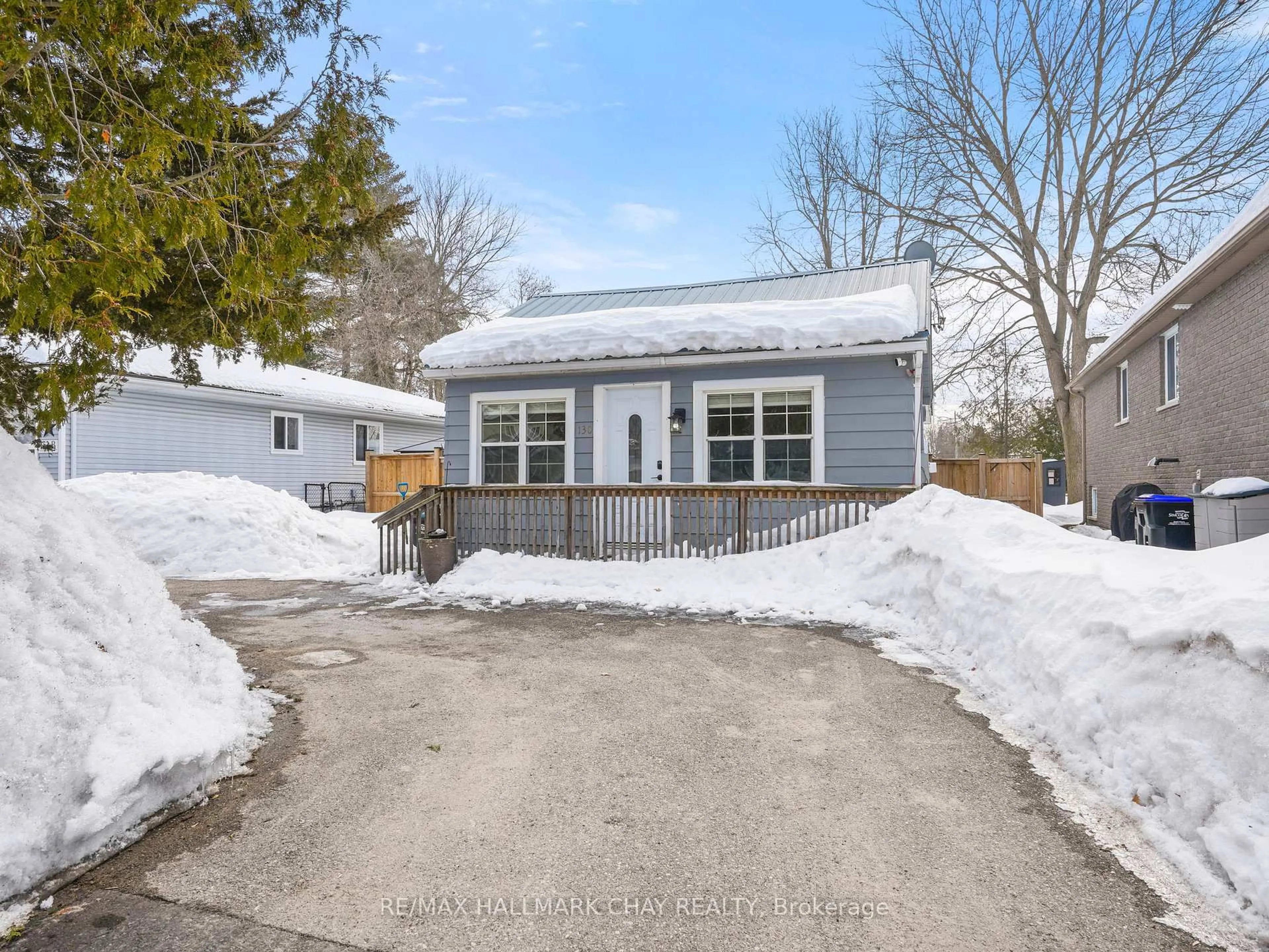 A pic from outside/outdoor area/front of a property/back of a property/a pic from drone, street for 130 Simcoe St, Essa Ontario L0M 1B0