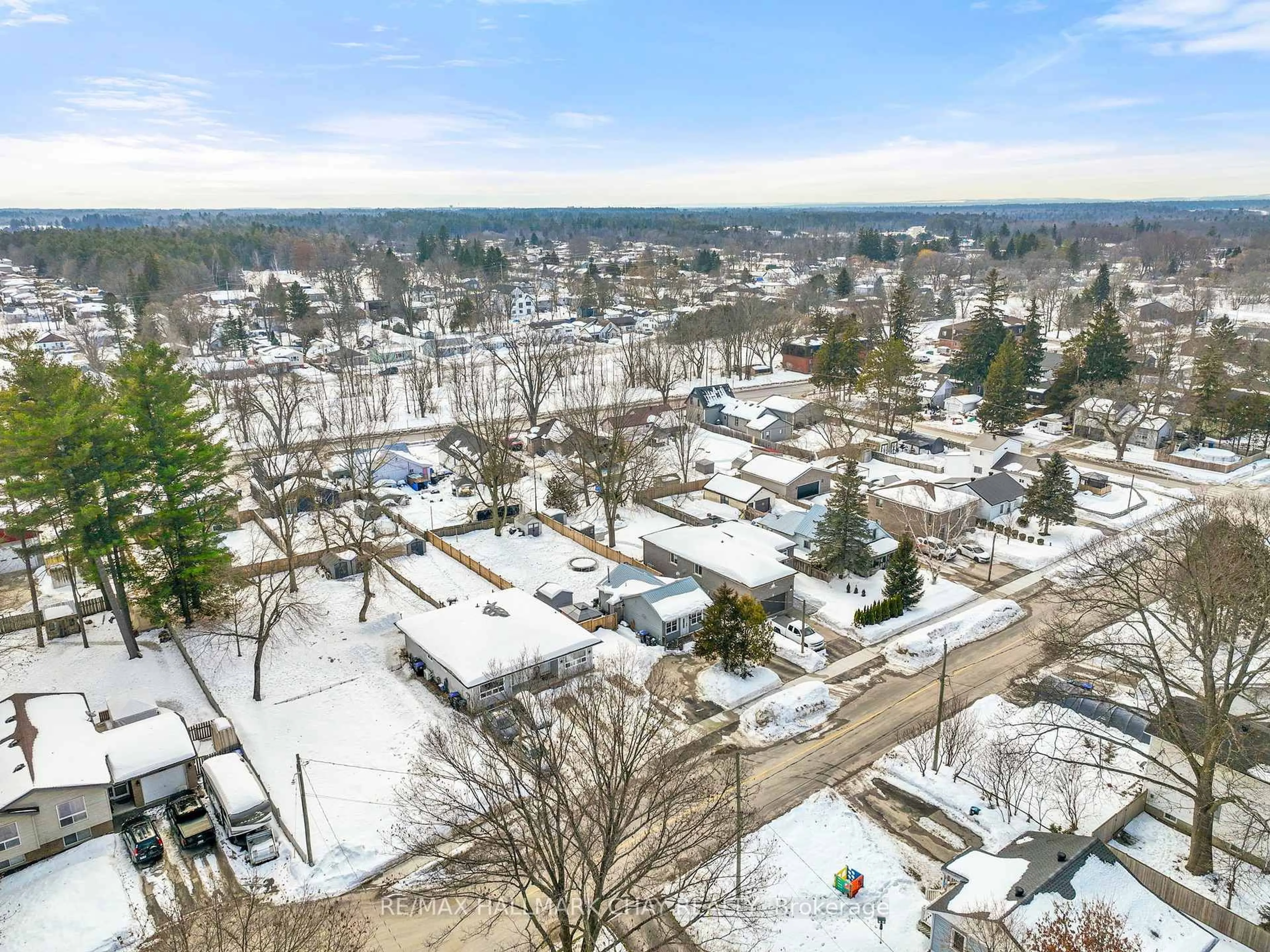 A pic from outside/outdoor area/front of a property/back of a property/a pic from drone, unknown for 130 Simcoe St, Essa Ontario L0M 1B0