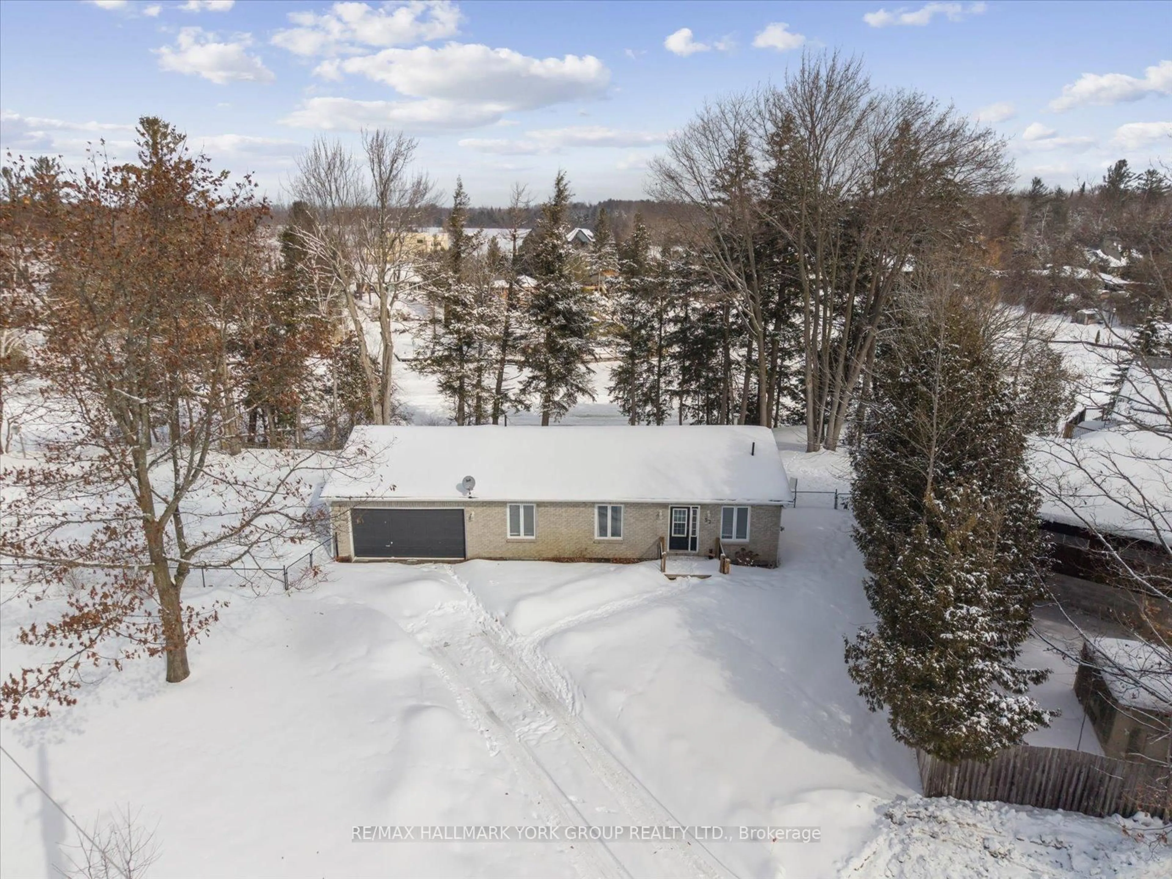 A pic from outside/outdoor area/front of a property/back of a property/a pic from drone, unknown for 57 Halmar Park Rd, Georgina Ontario L0E 1N0