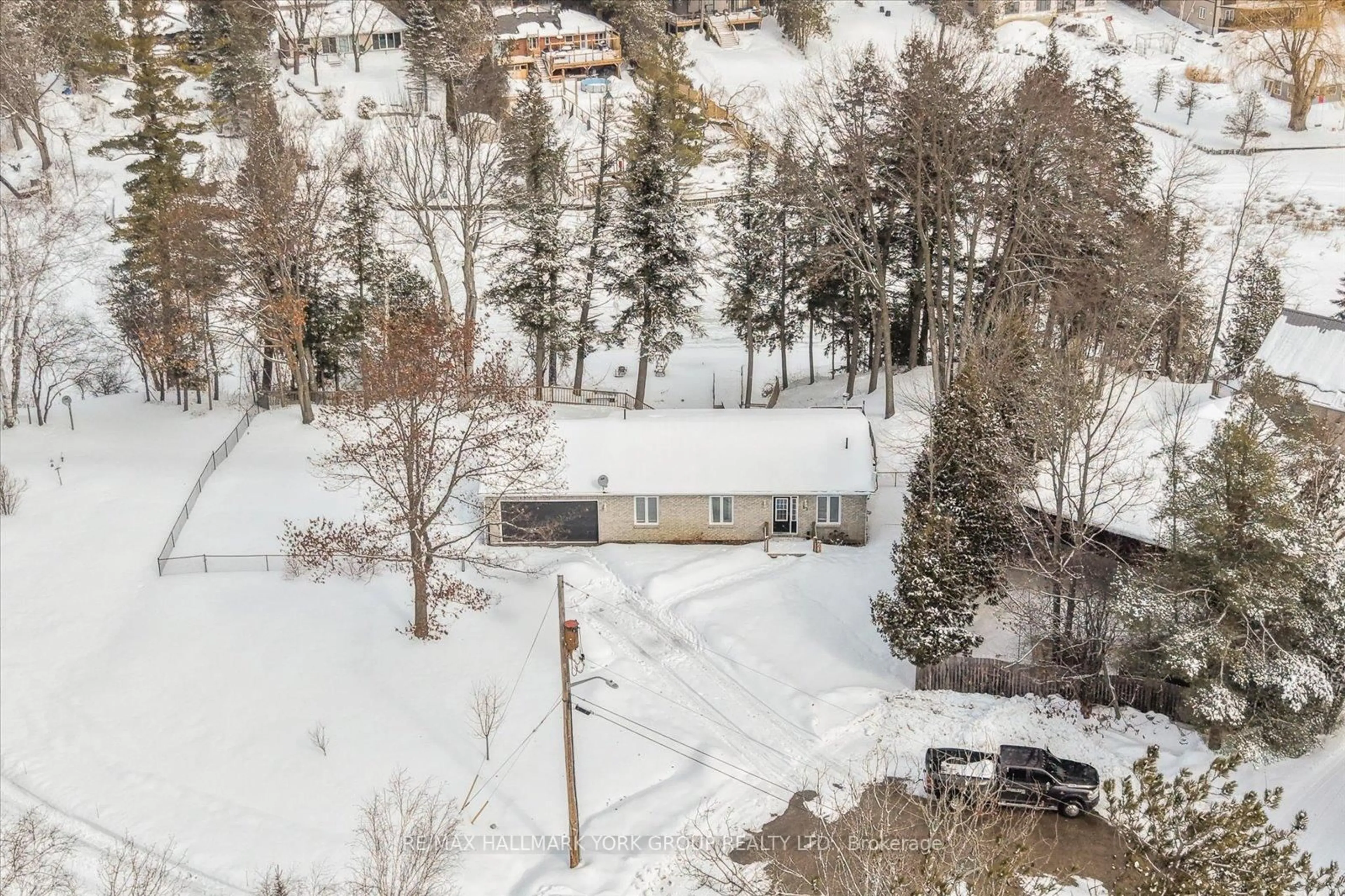 A pic from outside/outdoor area/front of a property/back of a property/a pic from drone, unknown for 57 Halmar Park Rd, Georgina Ontario L0E 1N0