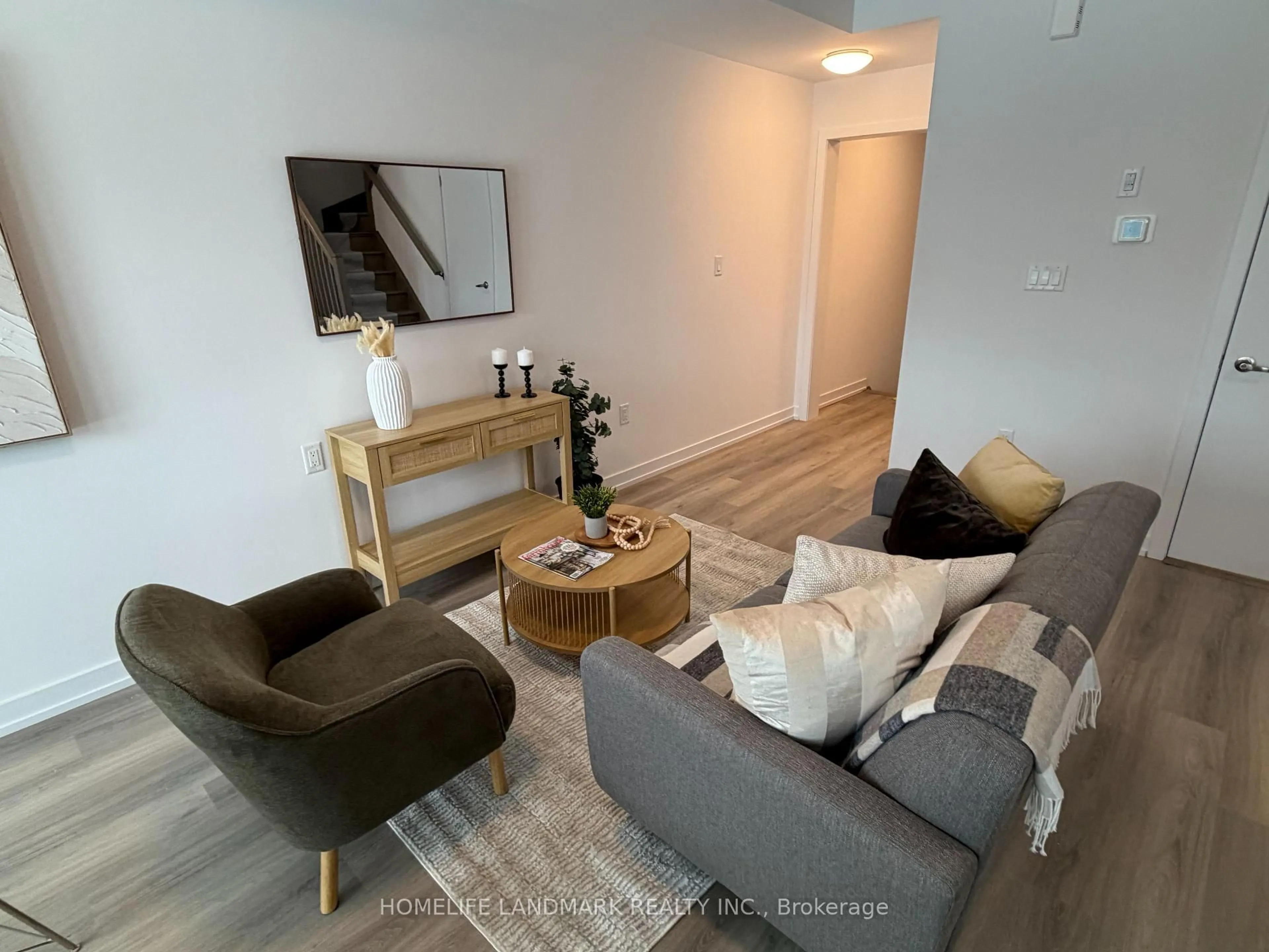 Living room with furniture, wood/laminate floor for 3 Bancroft Lane #209, Richmond Hill Ontario L4E 1M1