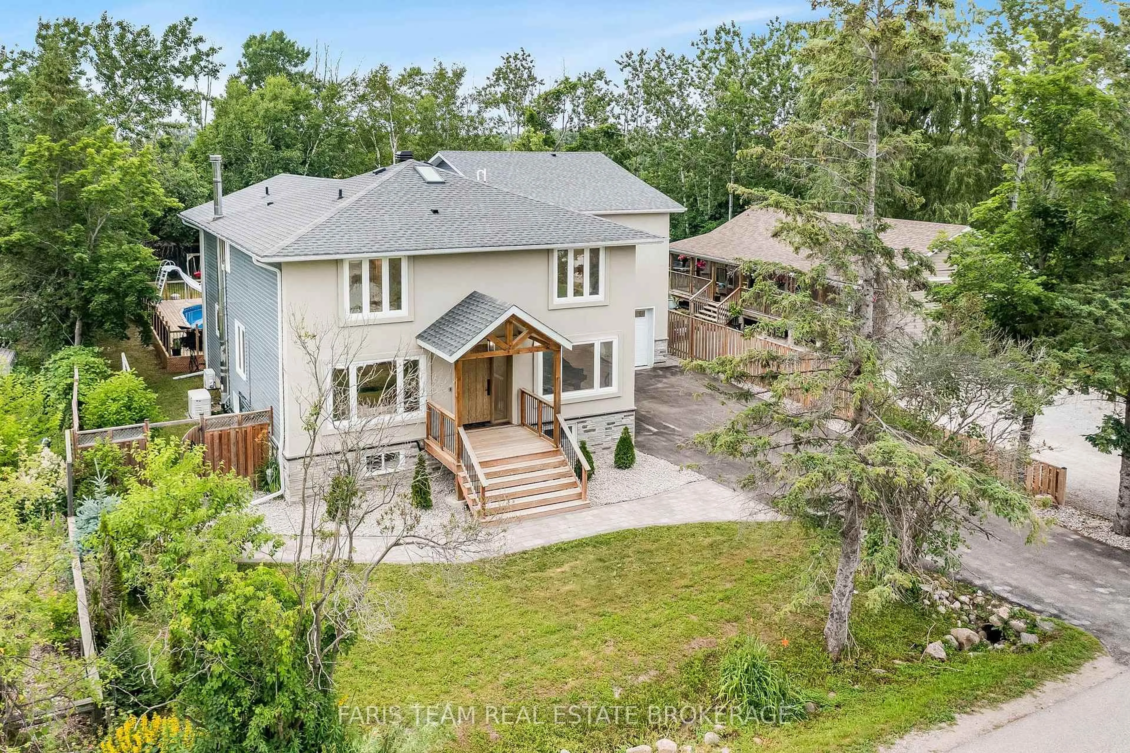 A pic from outside/outdoor area/front of a property/back of a property/a pic from drone, street for 1174 Belle Aire Beach Rd, Innisfil Ontario L0L 1C0