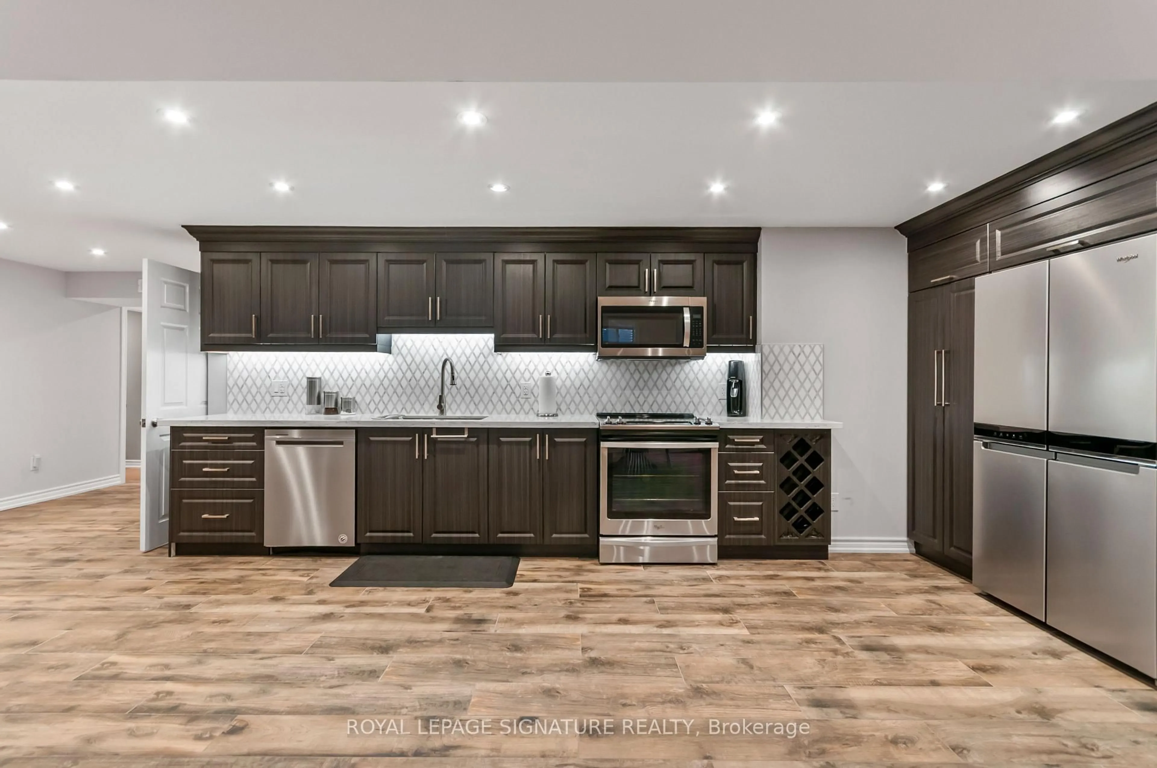Open concept kitchen, unknown for 80 Sharpe Cres, New Tecumseth Ontario L0G 1W0