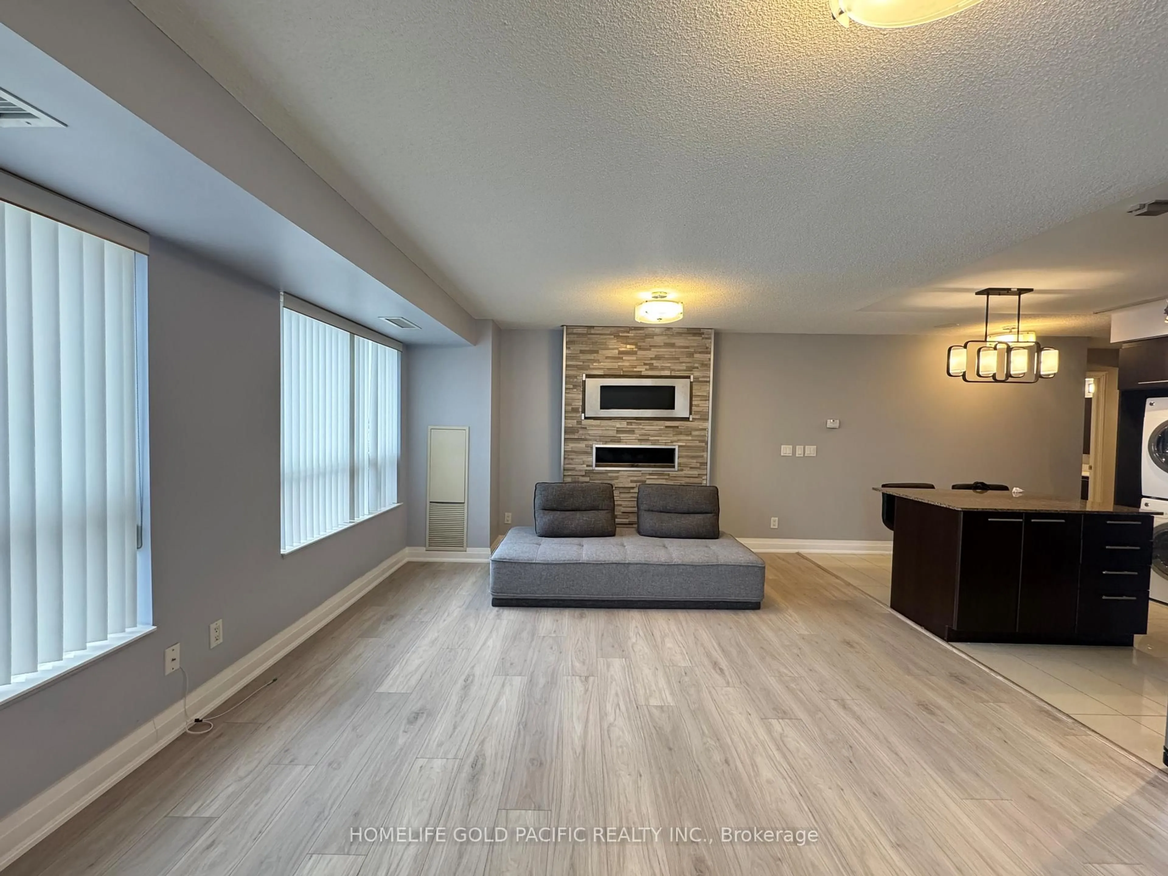 Living room with furniture, unknown for 37 Galleria Pkwy #207, Markham Ontario L3T 0A5