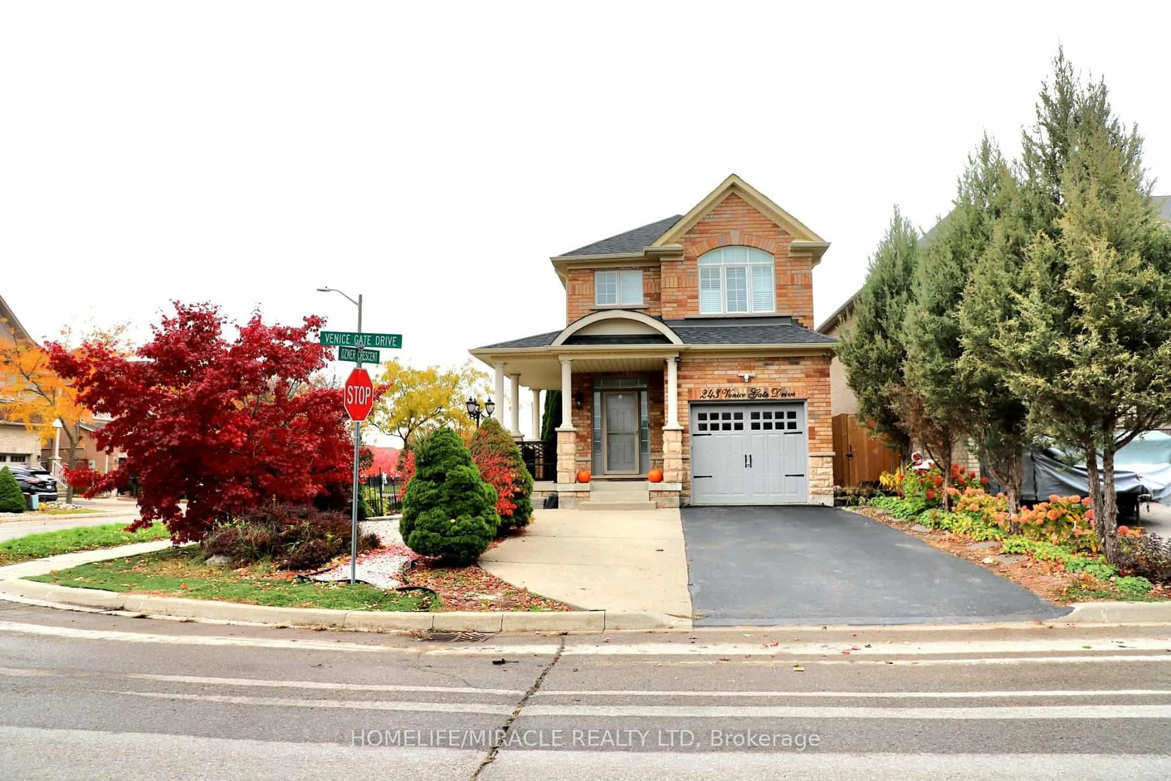 Home with brick exterior material, street for 243 Venice Gate Dr, Vaughan Ontario L4H 0G1