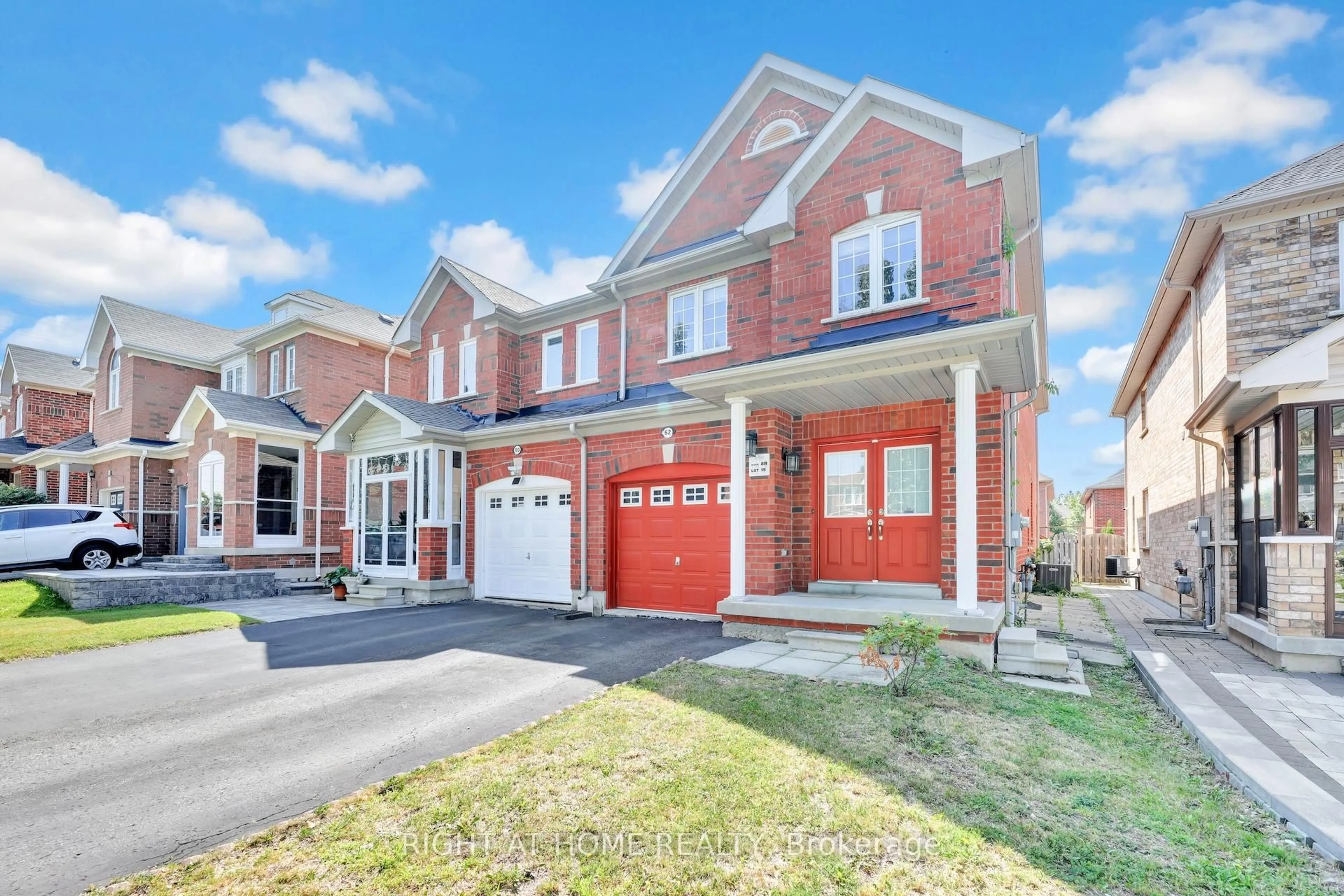 Home with brick exterior material, street for 62 Martini Dr, Richmond Hill Ontario L4S 2T7