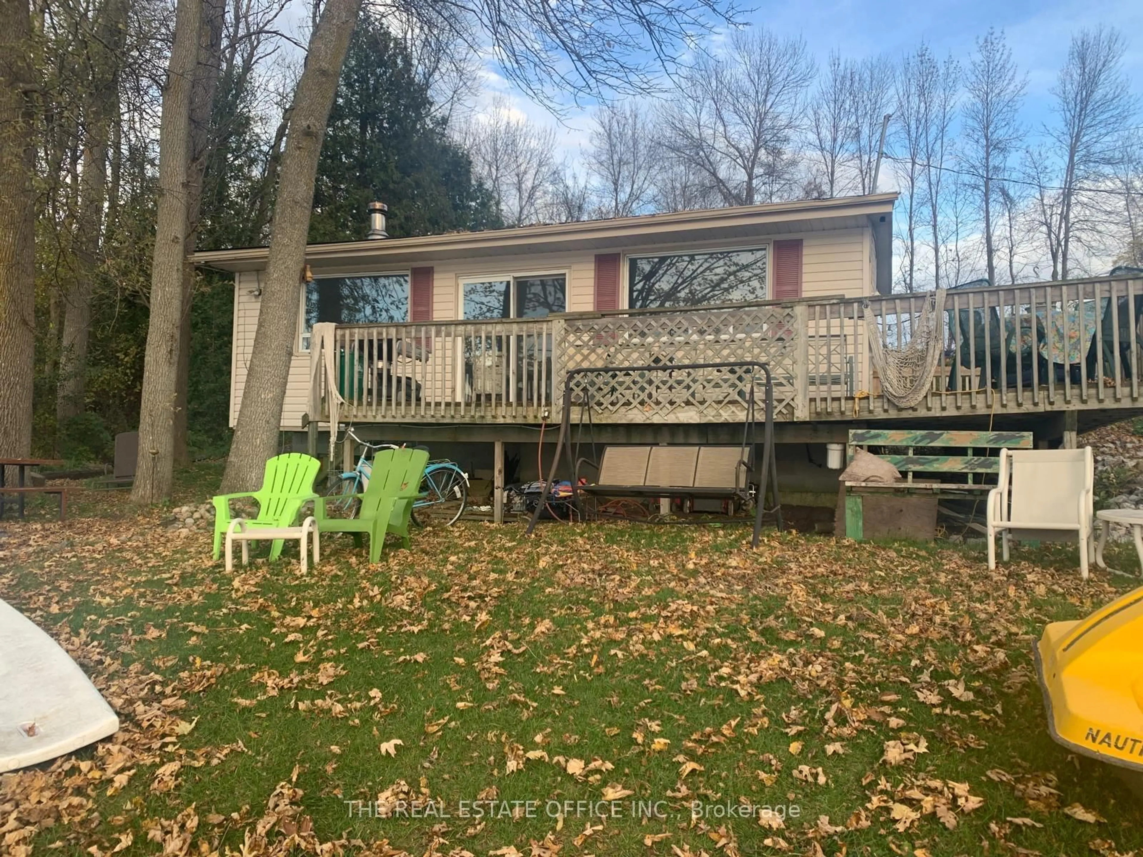 A pic from outside/outdoor area/front of a property/back of a property/a pic from drone, forest/trees view for 100 Alsops Beach Rd, Brock Ontario L0K 1A0