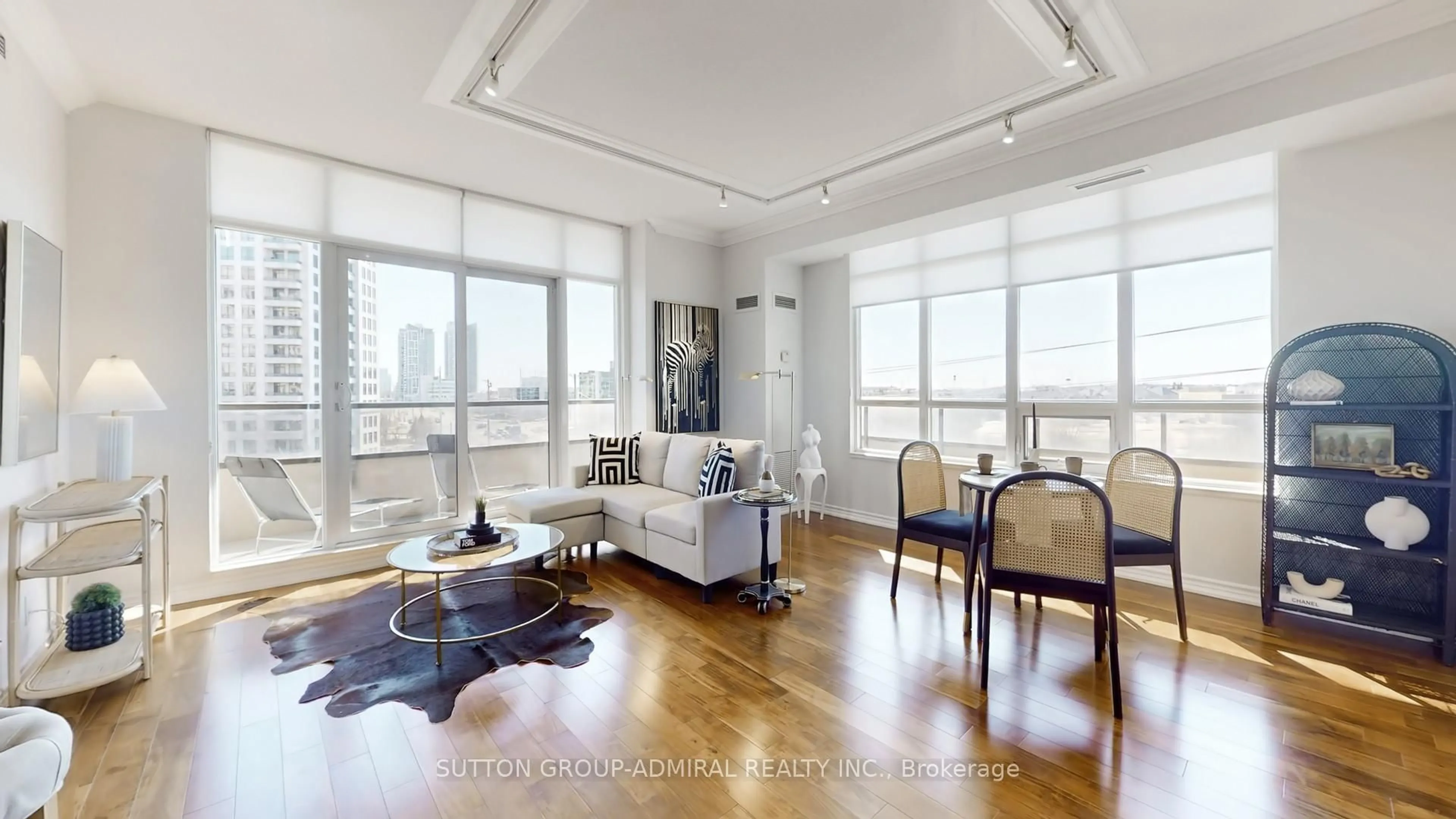 Living room with furniture, wood/laminate floor for 9235 Jane St #511, Vaughan Ontario L6A 0J8