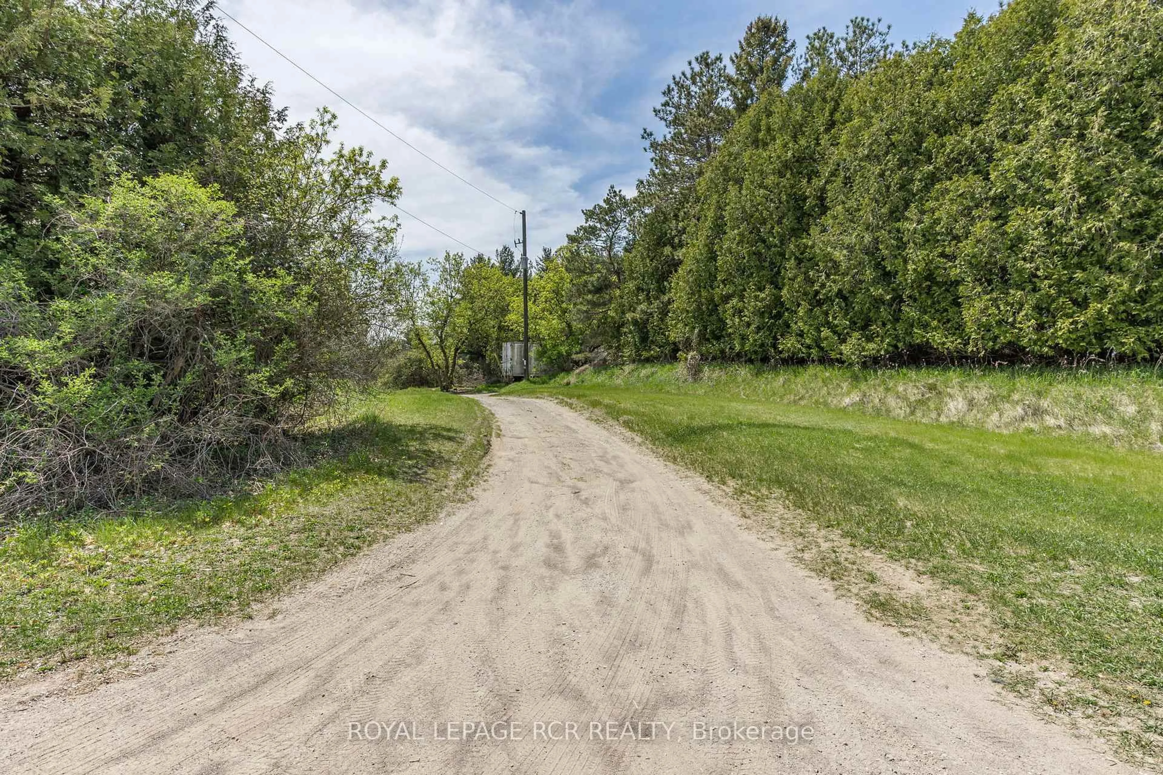 A pic from outside/outdoor area/front of a property/back of a property/a pic from drone, forest/trees view for 1092 Ballycroy Rd, Adjala-Tosorontio Ontario L0N 1P0