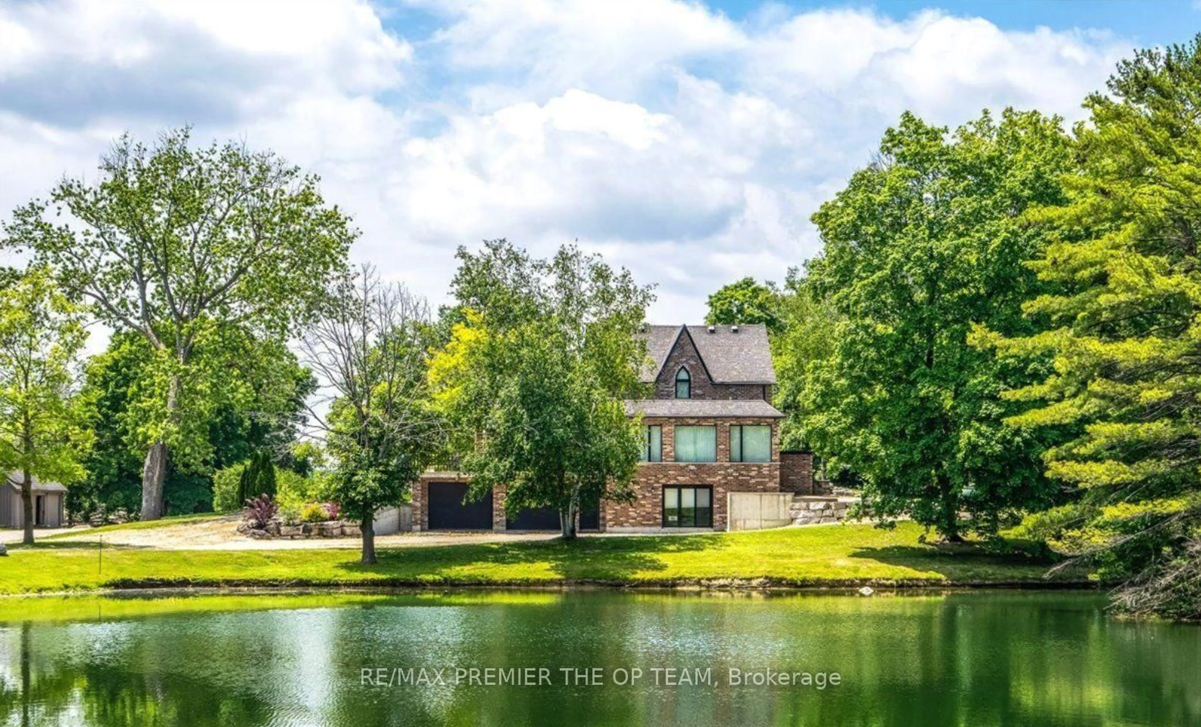 A pic from outside/outdoor area/front of a property/back of a property/a pic from drone, water/lake/river/ocean view for 12490 Mill Rd, King Ontario L7B 1K4