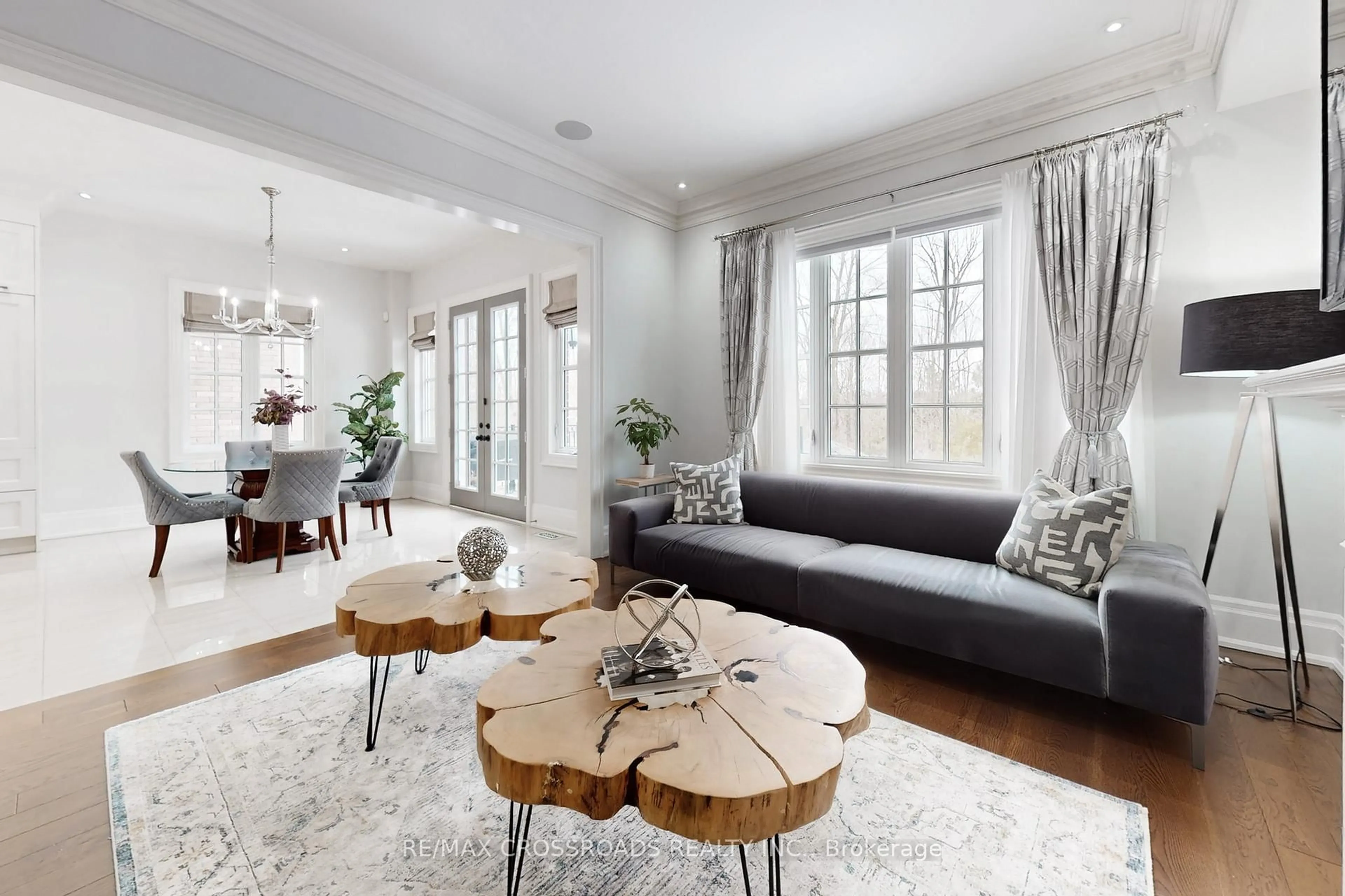 Living room with furniture, wood/laminate floor for 76 Annsleywood Crt, Vaughan Ontario L4H 4G6