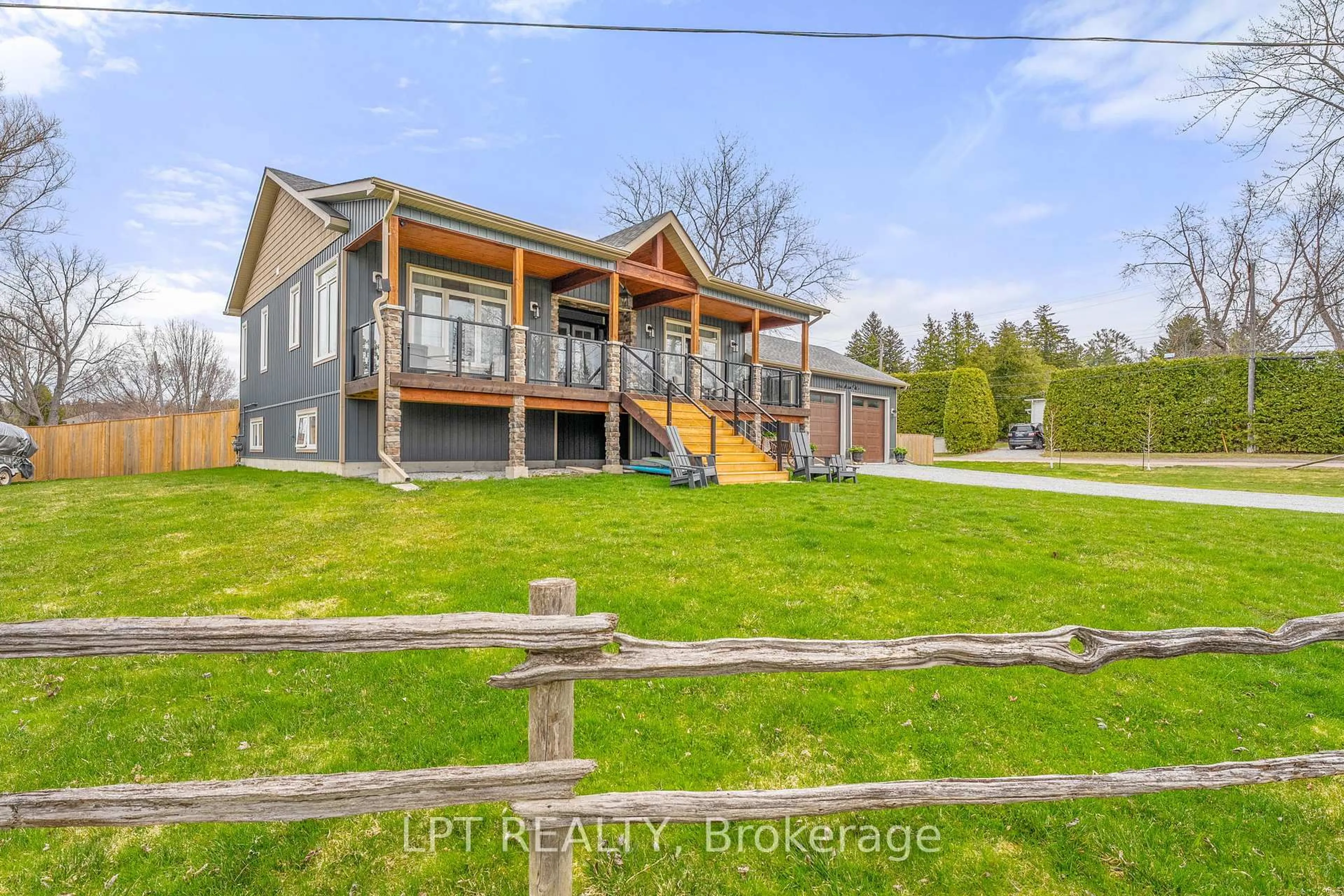 A pic from outside/outdoor area/front of a property/back of a property/a pic from drone, water/lake/river/ocean view for 23 Dunkelman Dr, Georgina Ontario L4P 3C8