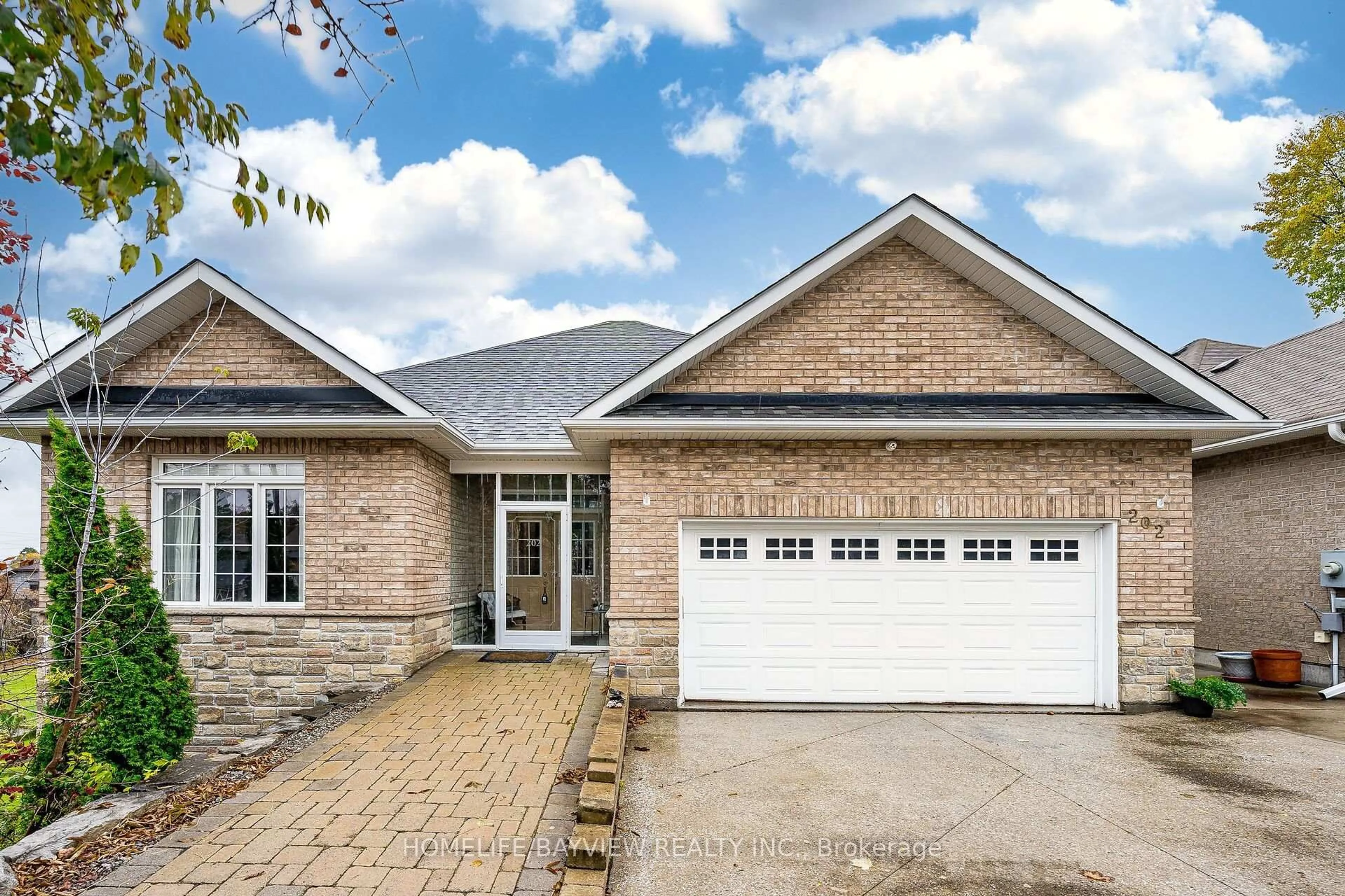 Home with brick exterior material, street for 202 John St, Bradford West Gwillimbury Ontario L3Z 1J5