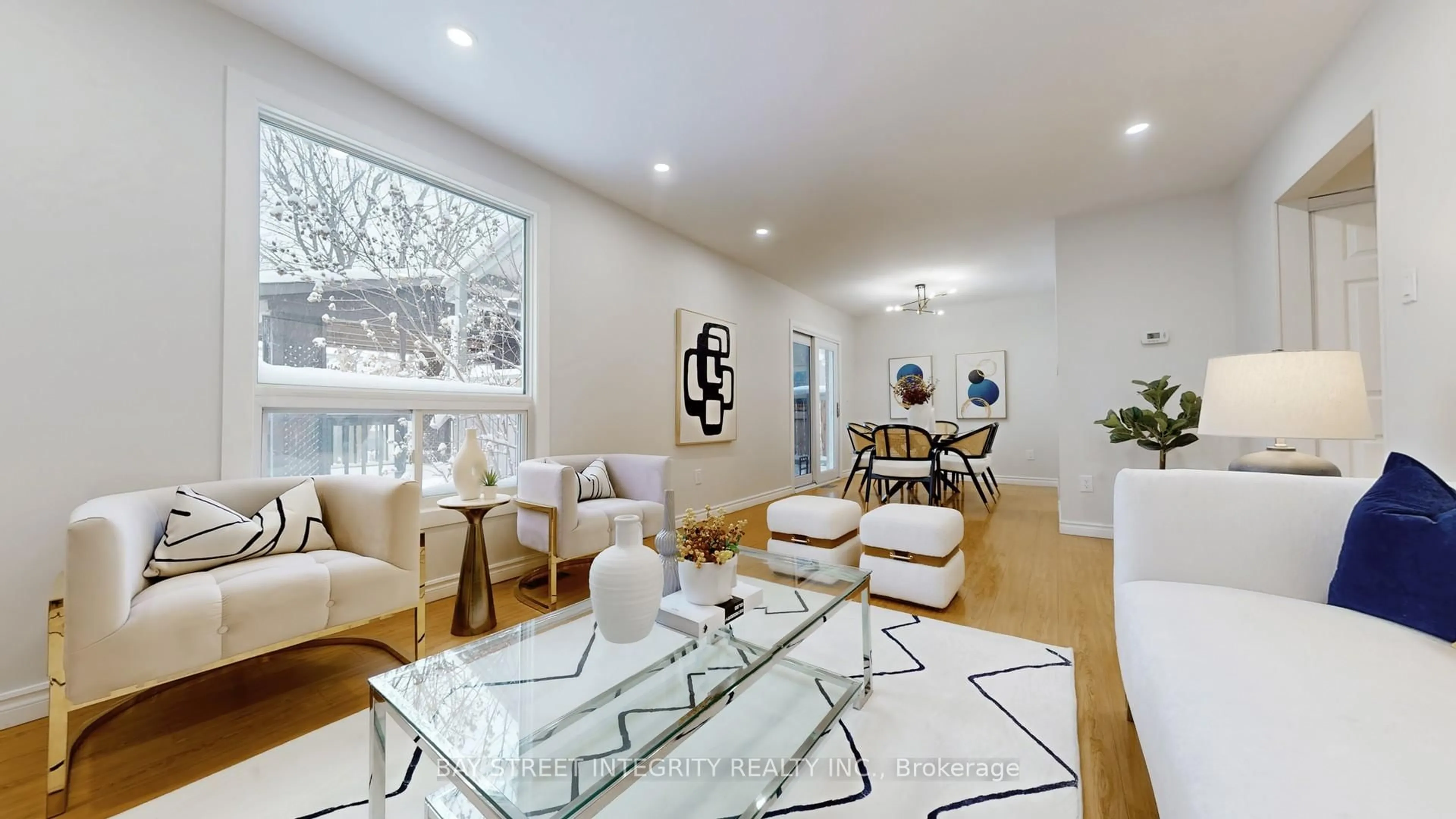 Living room with furniture, wood/laminate floor for 493 Sandford St, Newmarket Ontario L3Y 5E2