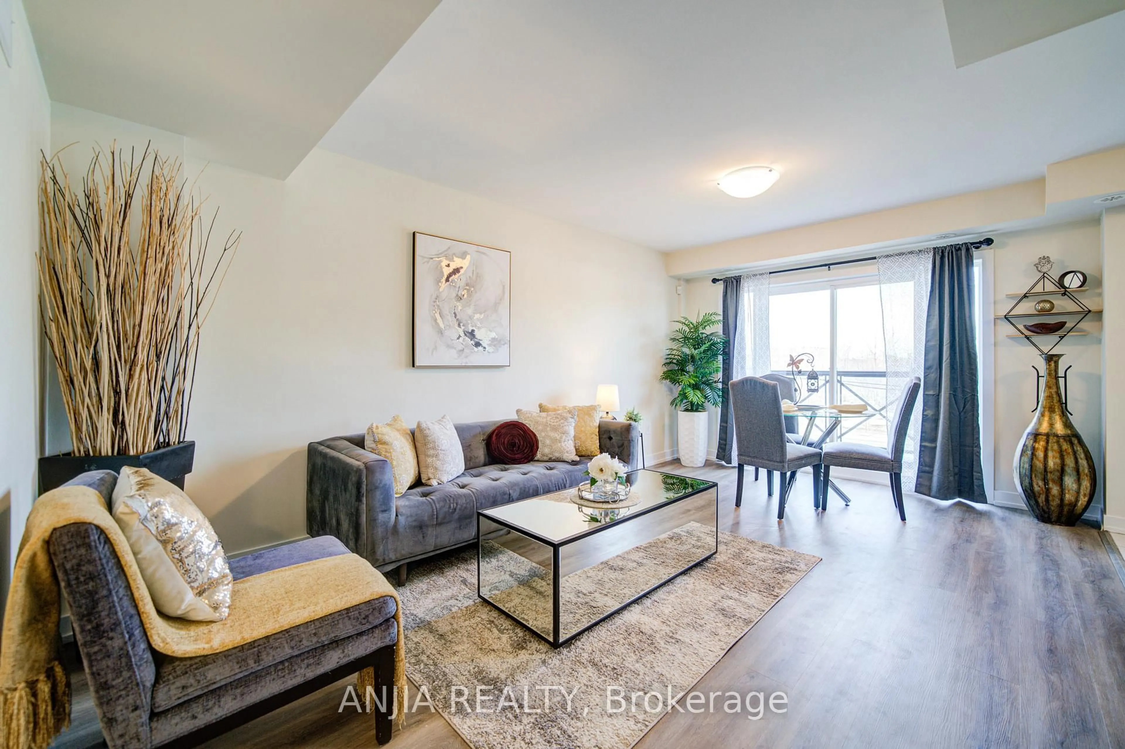 Living room with furniture, wood/laminate floor for 10 Westmeath Lane #2209, Markham Ontario L6B 1N5