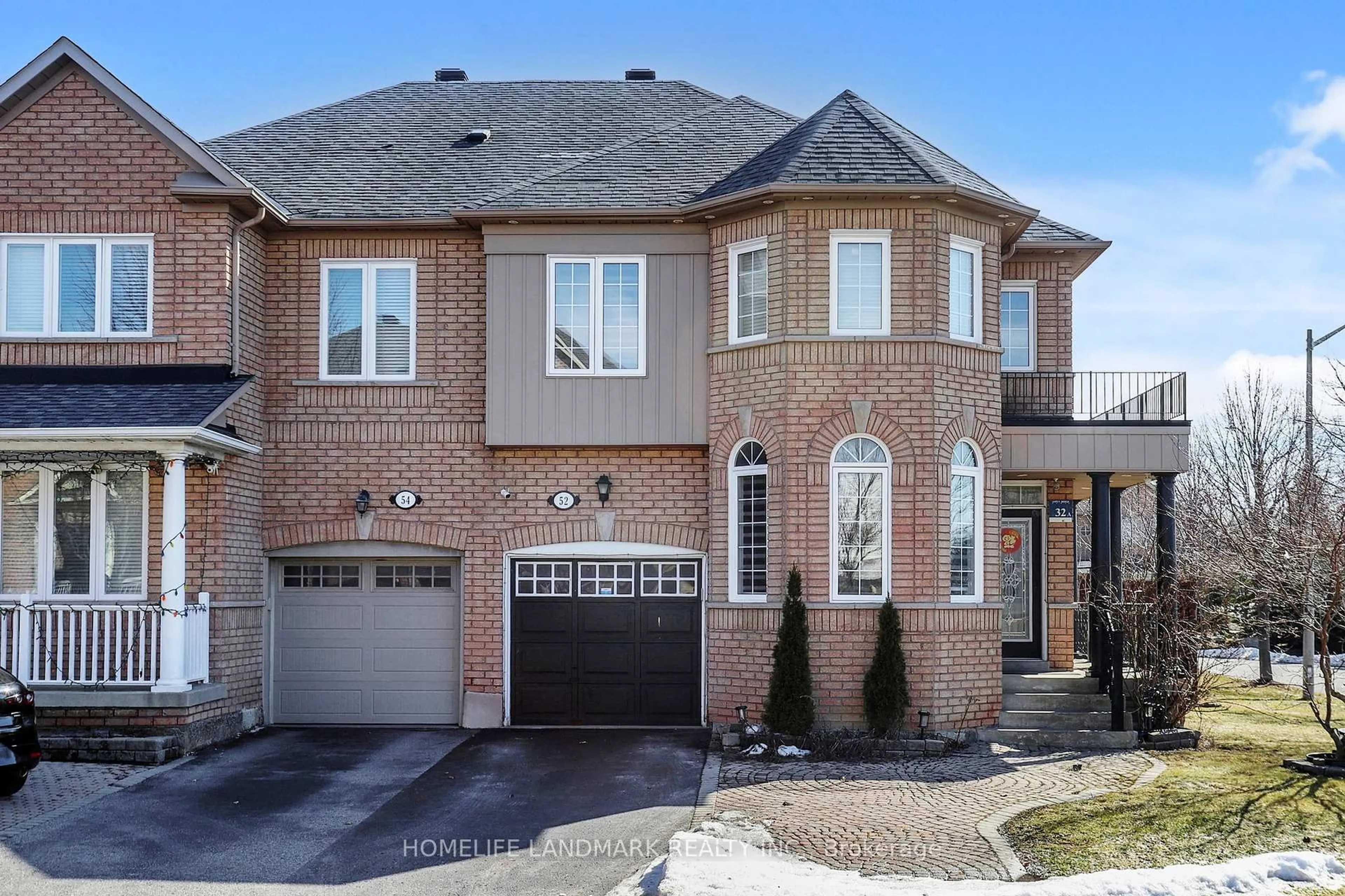 Home with brick exterior material, street for 52 Lakespring Dr, Markham Ontario L6C 2Z1