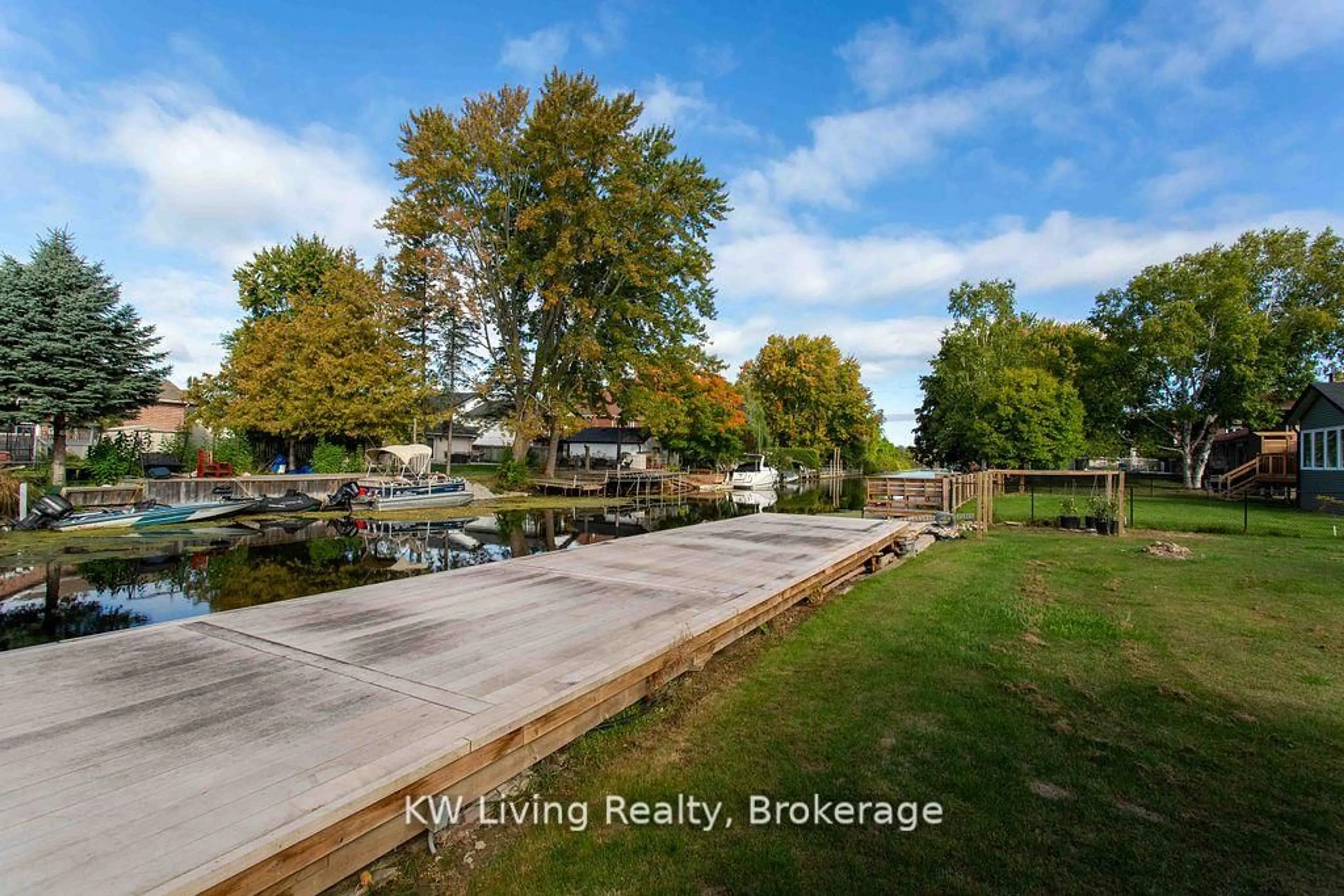 A pic from outside/outdoor area/front of a property/back of a property/a pic from drone, water/lake/river/ocean view for 702 Lake Dr, Georgina Ontario L4P 1V1