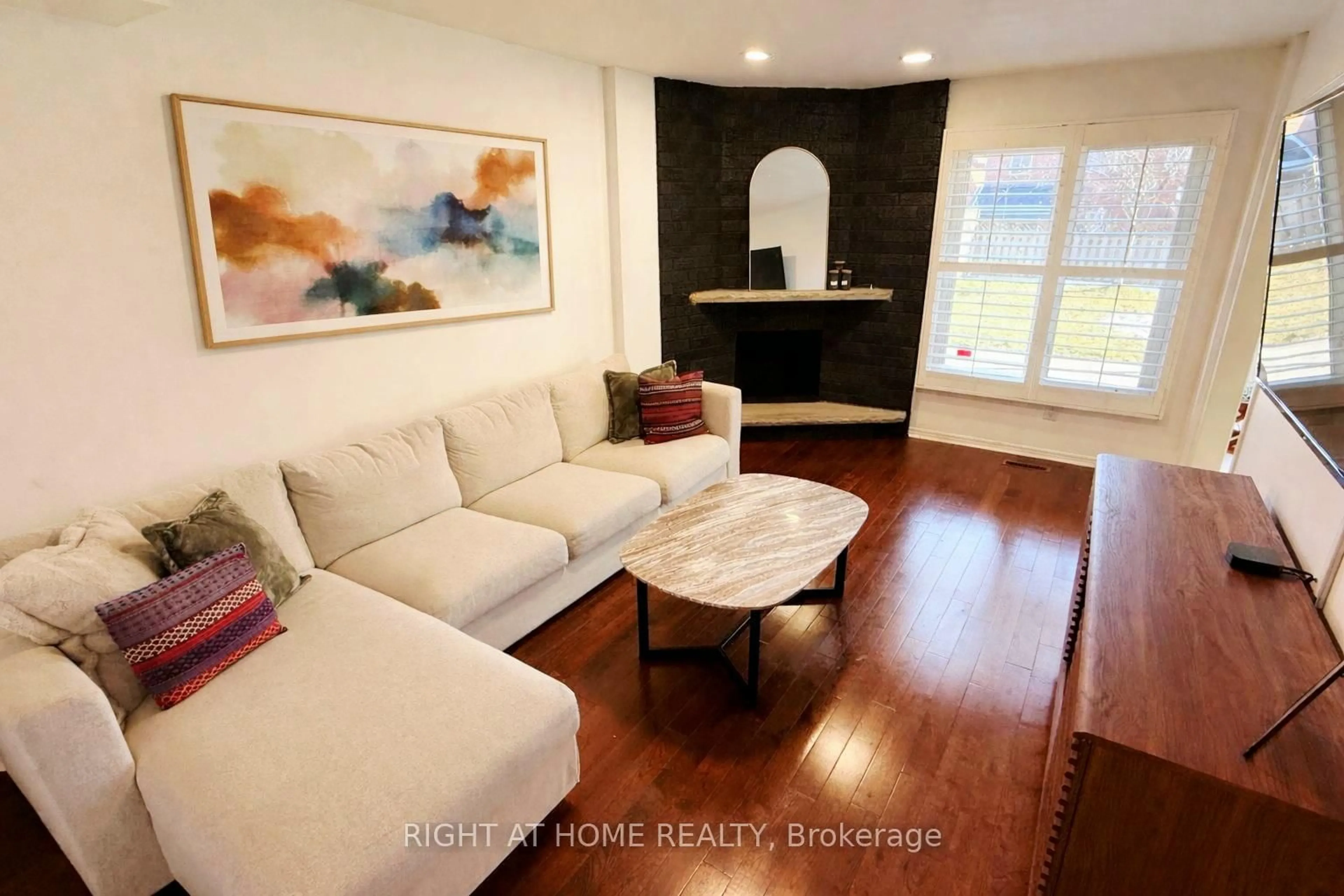 Living room with furniture, wood/laminate floor for 94 Afton Cres, Vaughan Ontario L6A 1G9