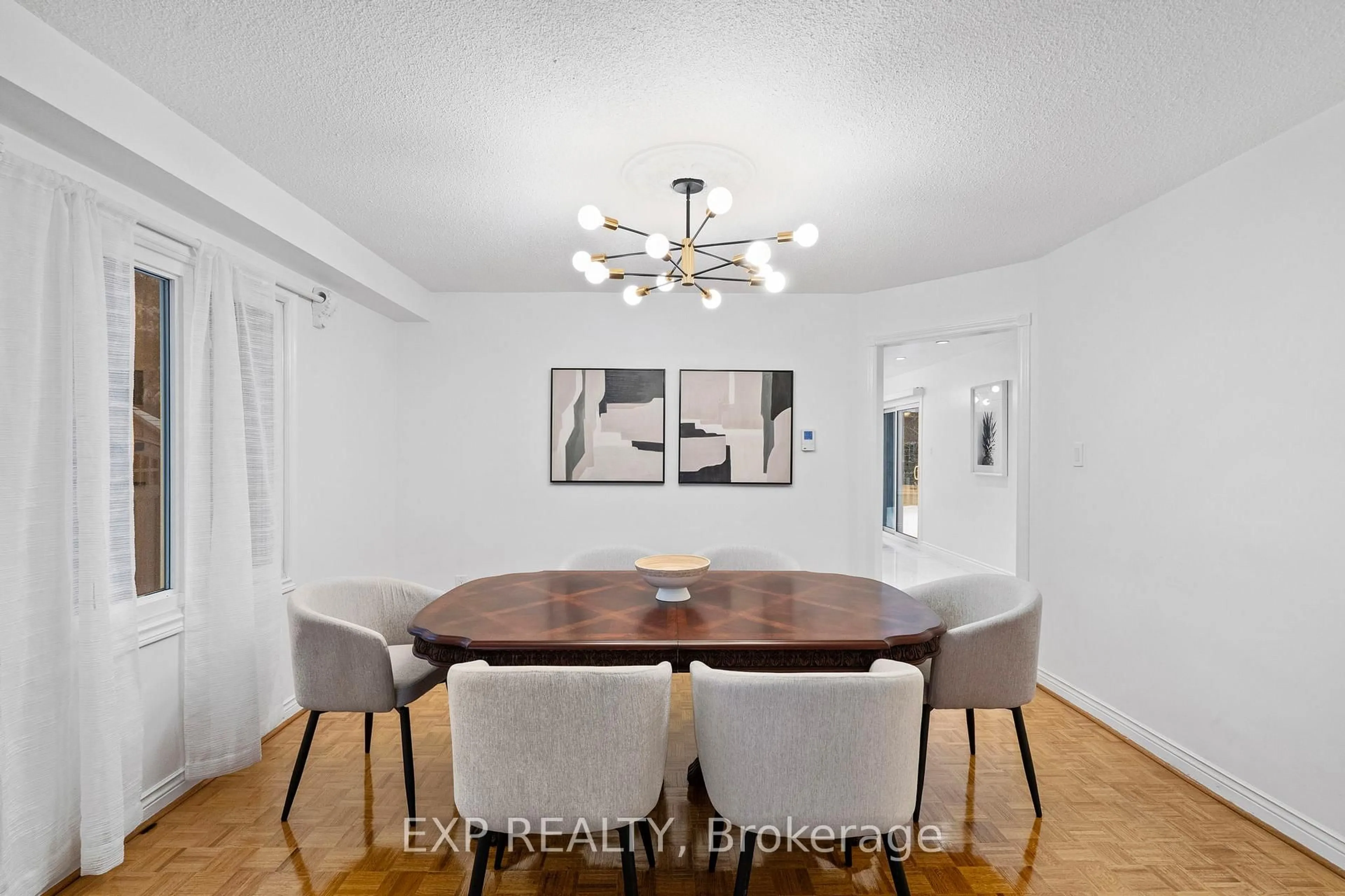 Dining room, wood/laminate floor for 54 Holbrook Crt, Markham Ontario L3R 7P8