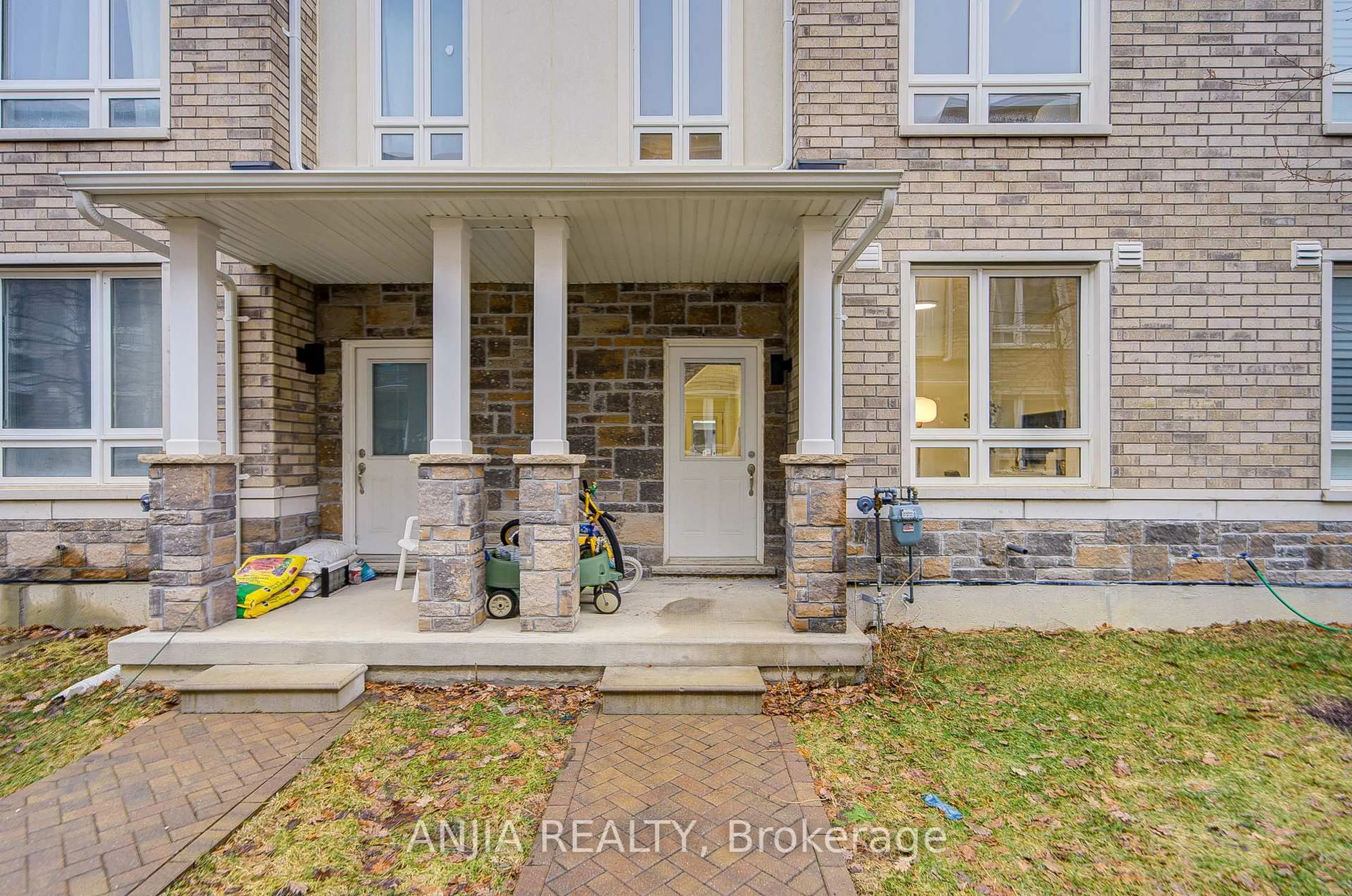 Home with brick exterior material, street for 82 Chicago Lane, Markham Ontario L6E 2B9