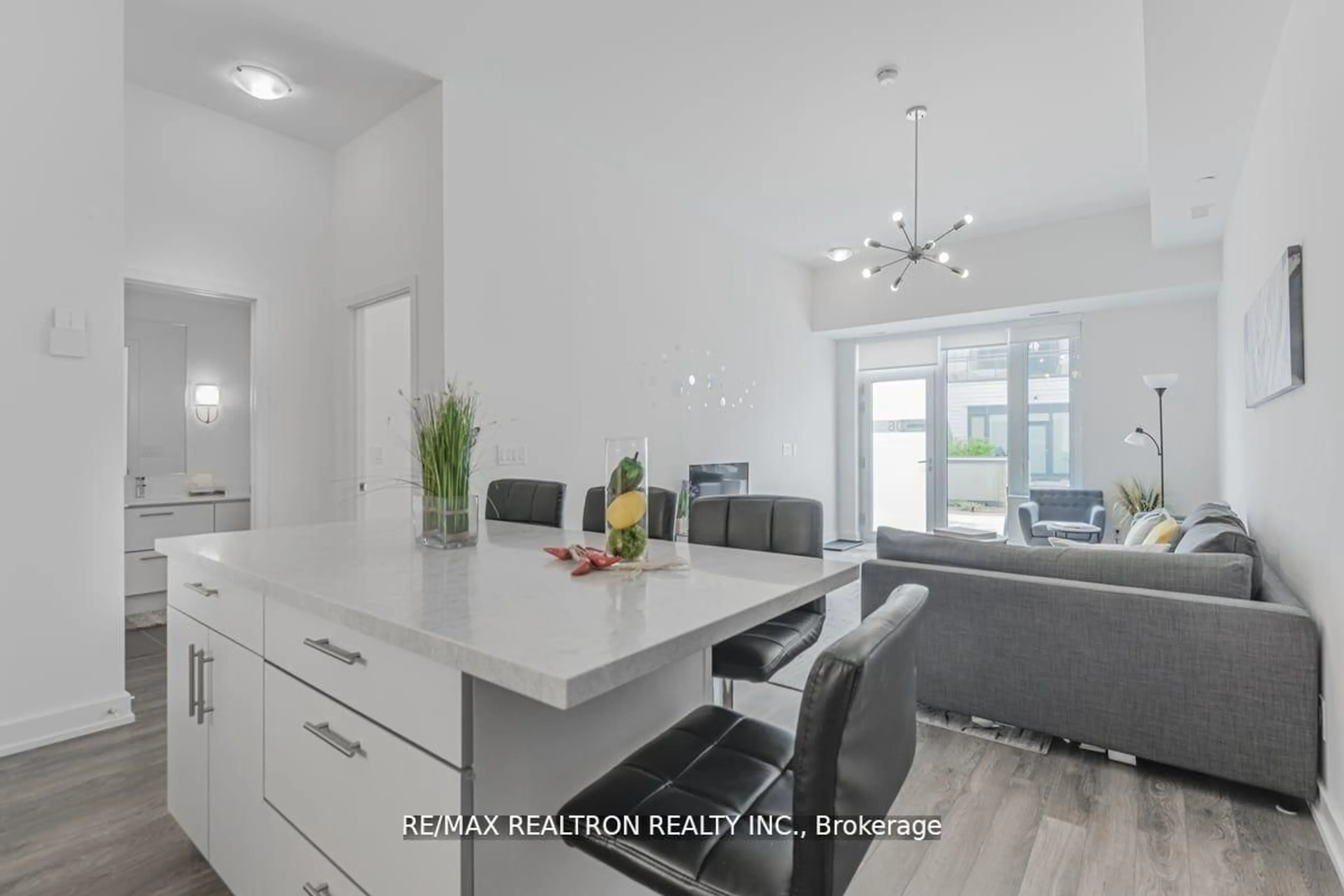 Open concept kitchen, ceramic/tile floor for 303 Broward Way #106, Innisfil Ontario L9S 0M1