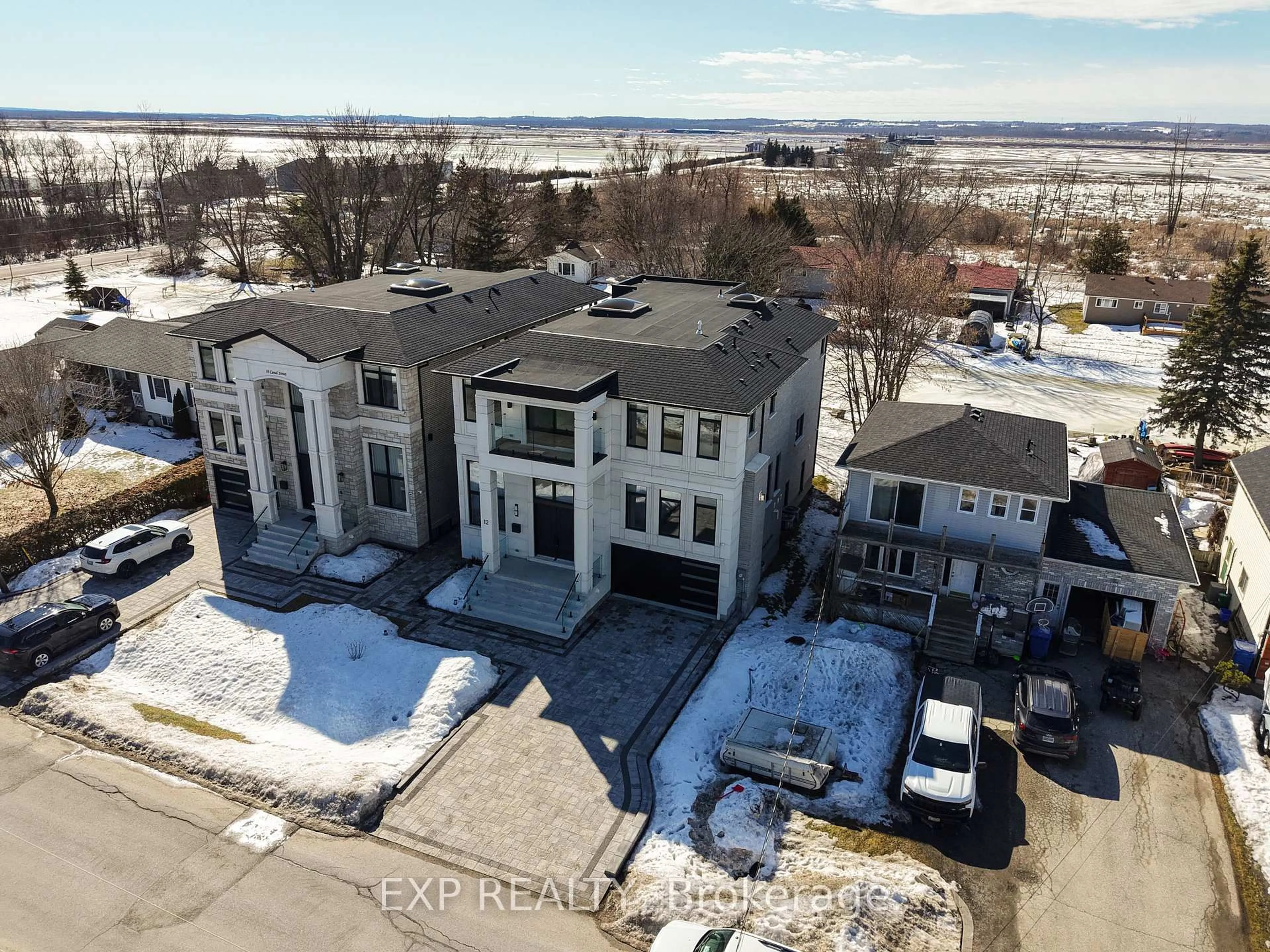 A pic from outside/outdoor area/front of a property/back of a property/a pic from drone, unknown for 12 Canal St, Georgina Ontario L4P 1K5