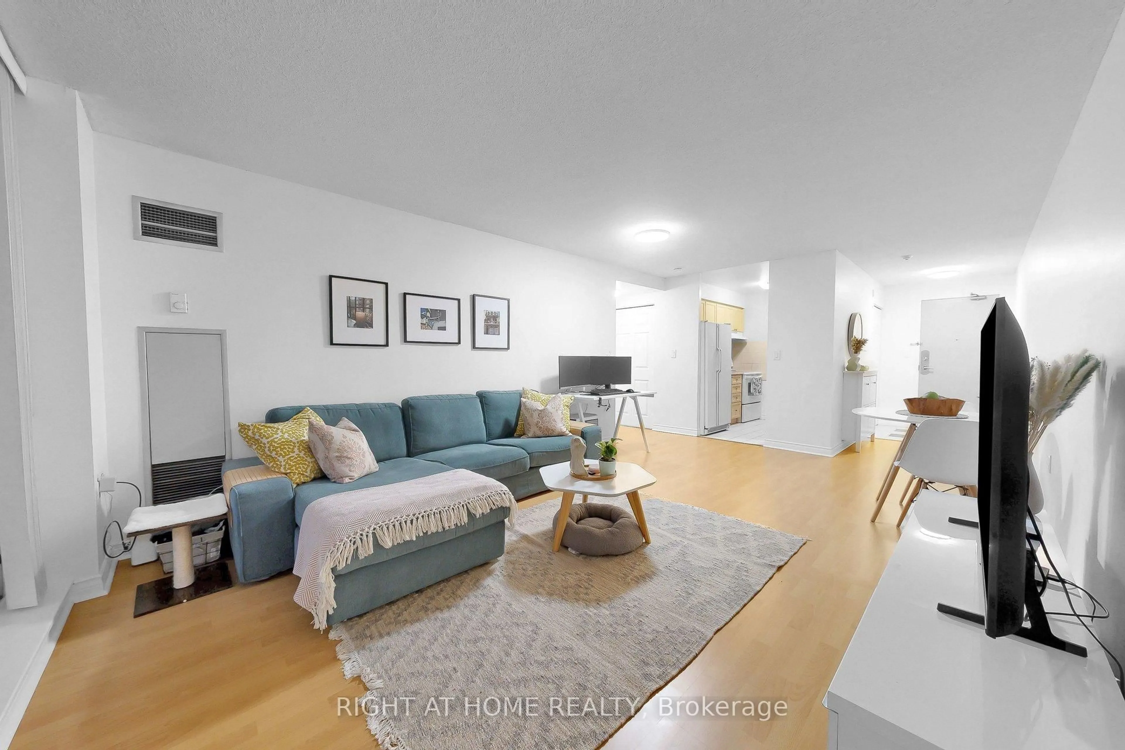 Living room with furniture, unknown for 2100 John St #216, Markham Ontario L3T 7S6