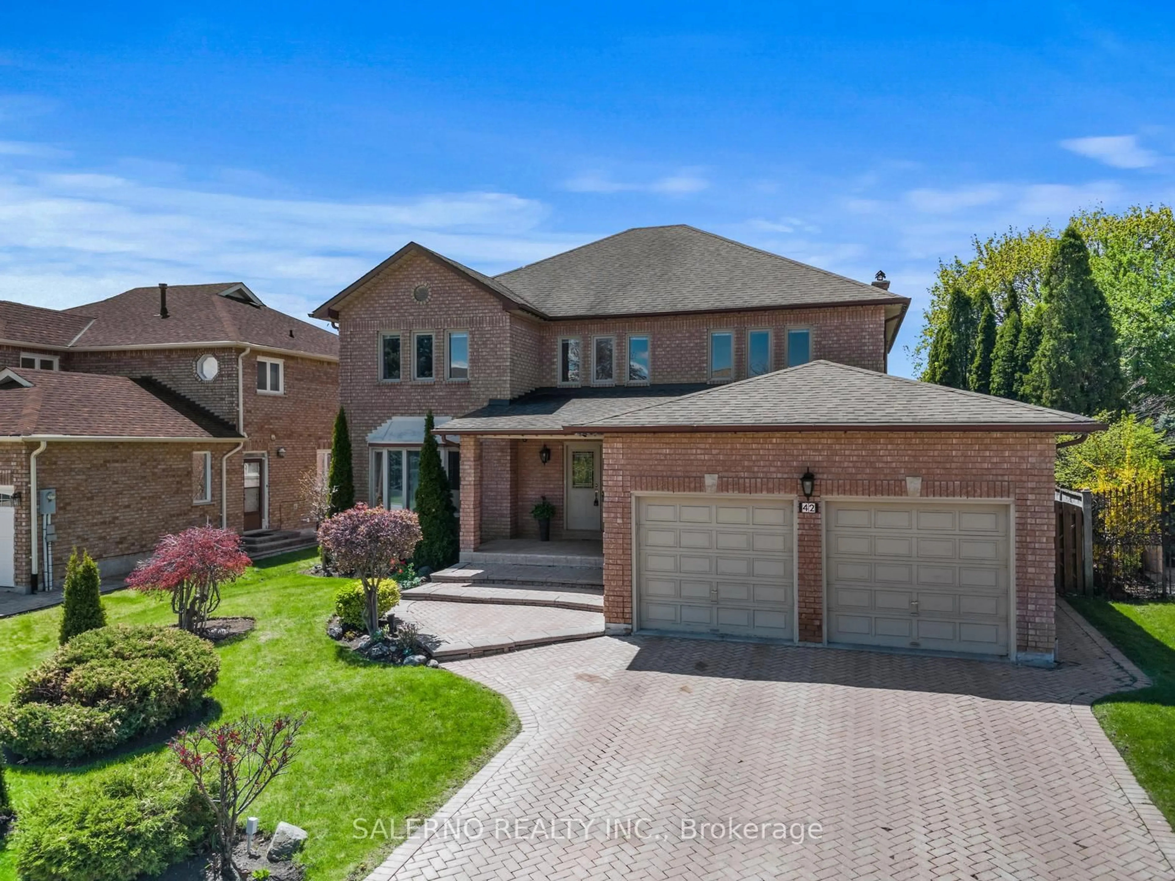 Home with brick exterior material, street for 42 Columbus Ave, Vaughan Ontario L4L 7G9