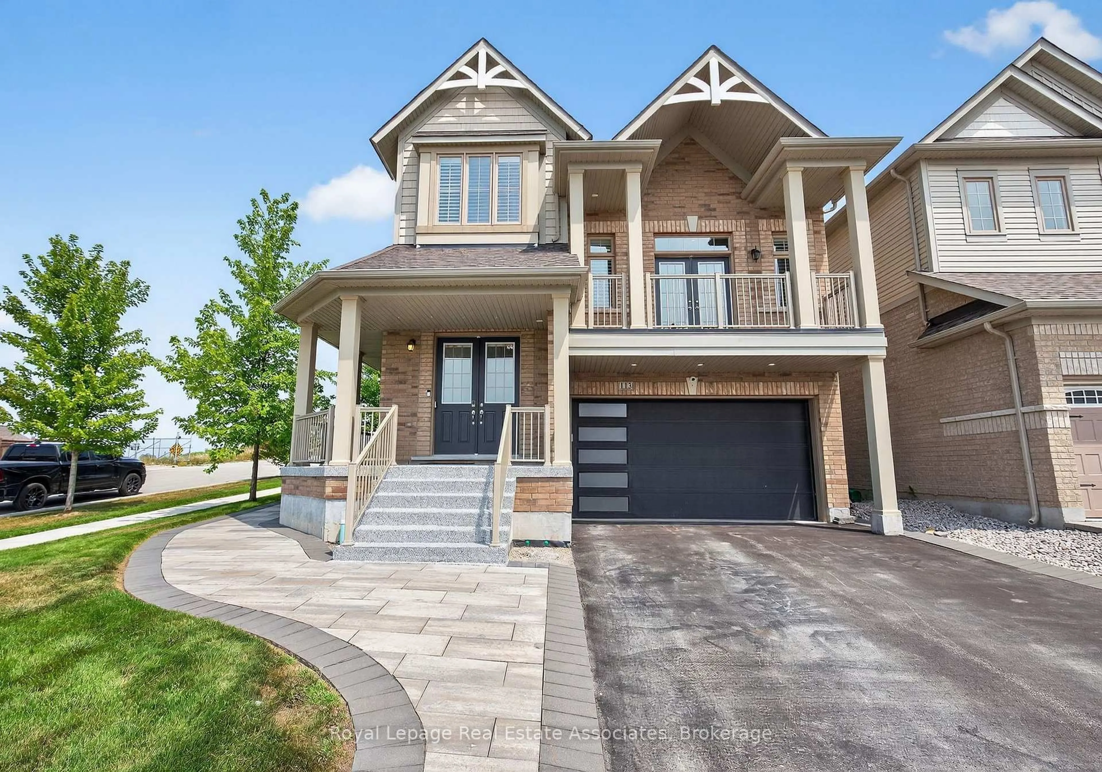 Home with brick exterior material, street for 113 Sutcliffe Way, New Tecumseth Ontario L9R 0N9