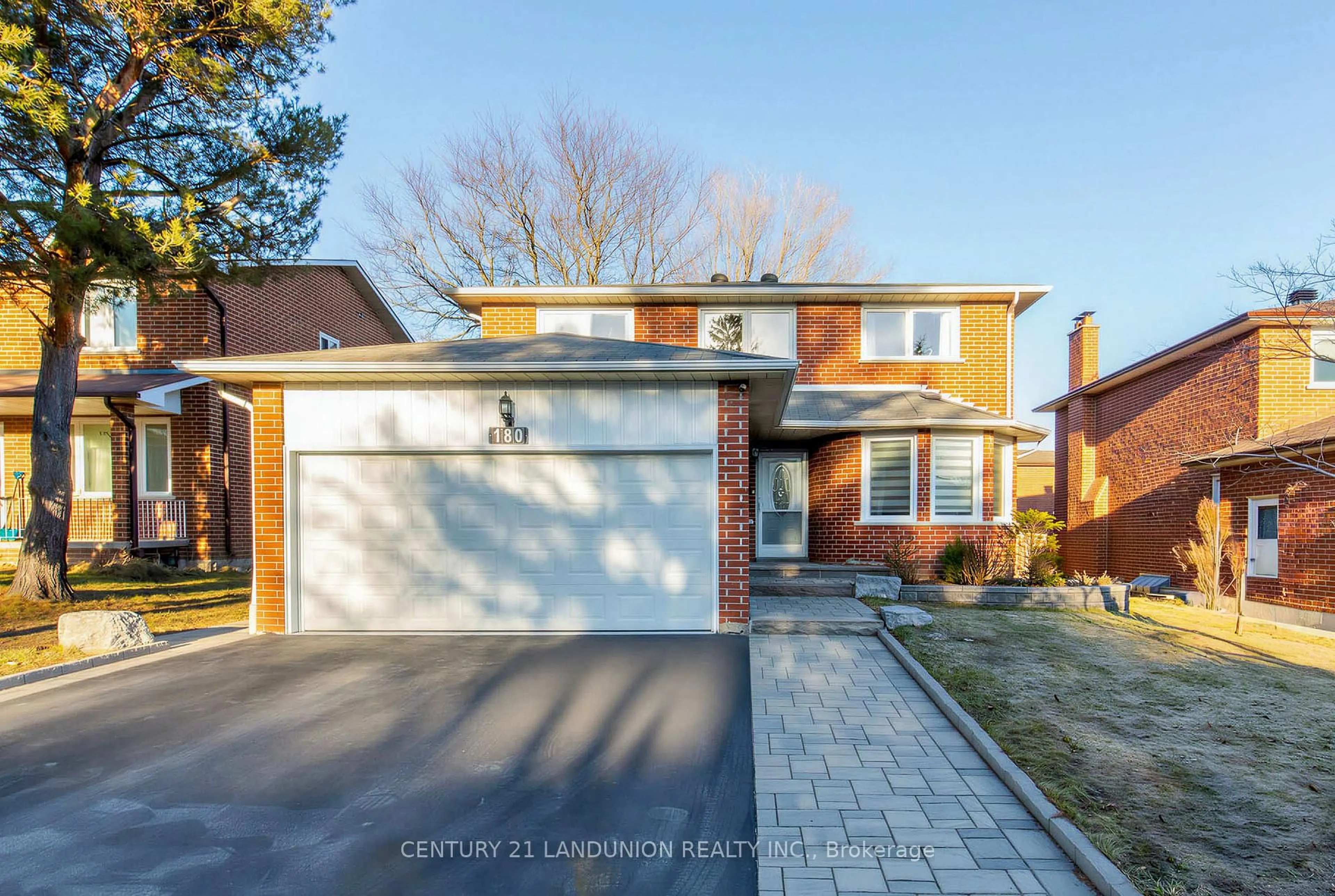 Home with brick exterior material, street for 180 Willowbrook Rd, Markham Ontario L3T 5P6