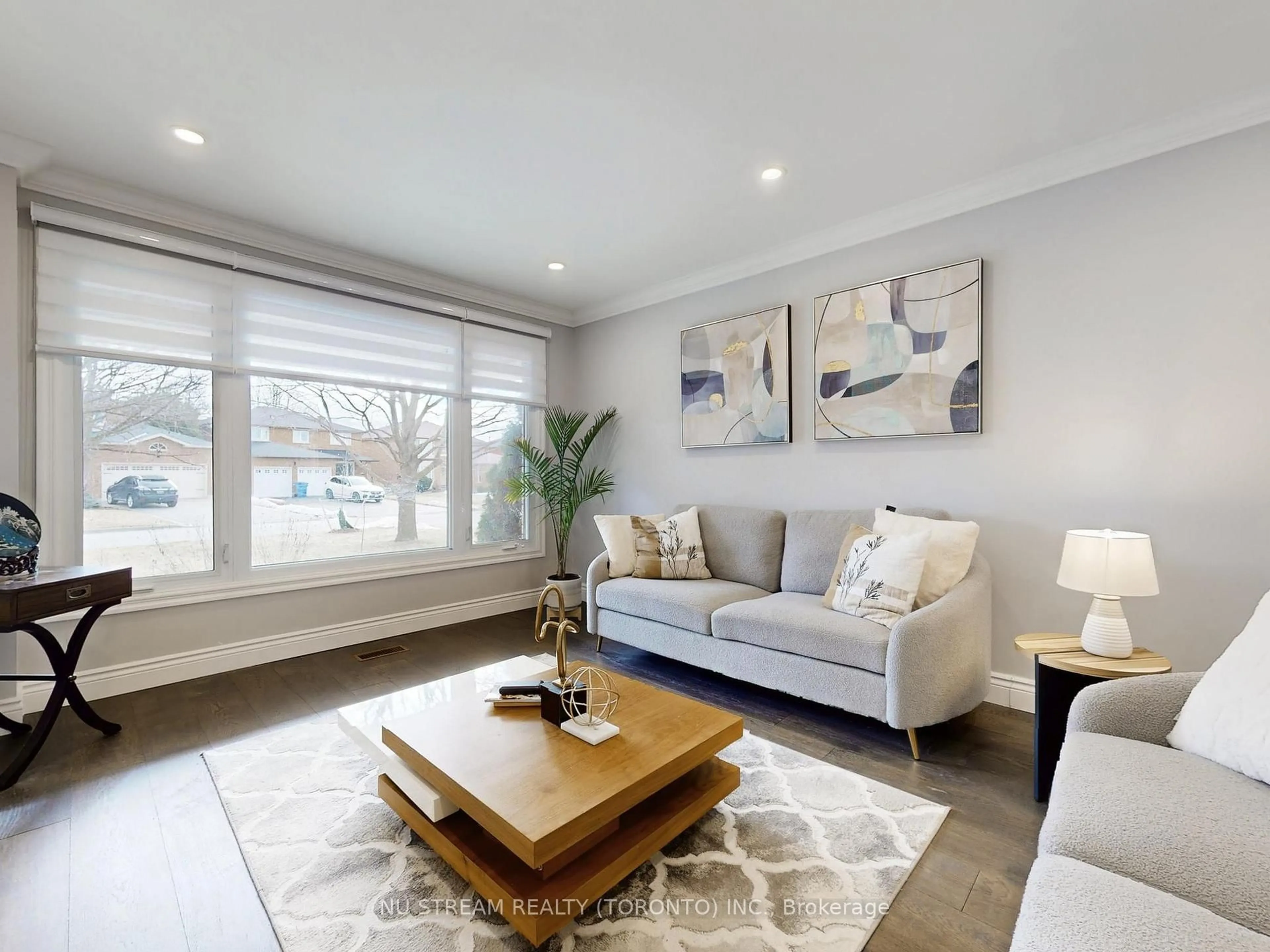 Living room with furniture, wood/laminate floor for 64 Aspen Cres, Whitchurch-Stouffville Ontario L4A 5C7