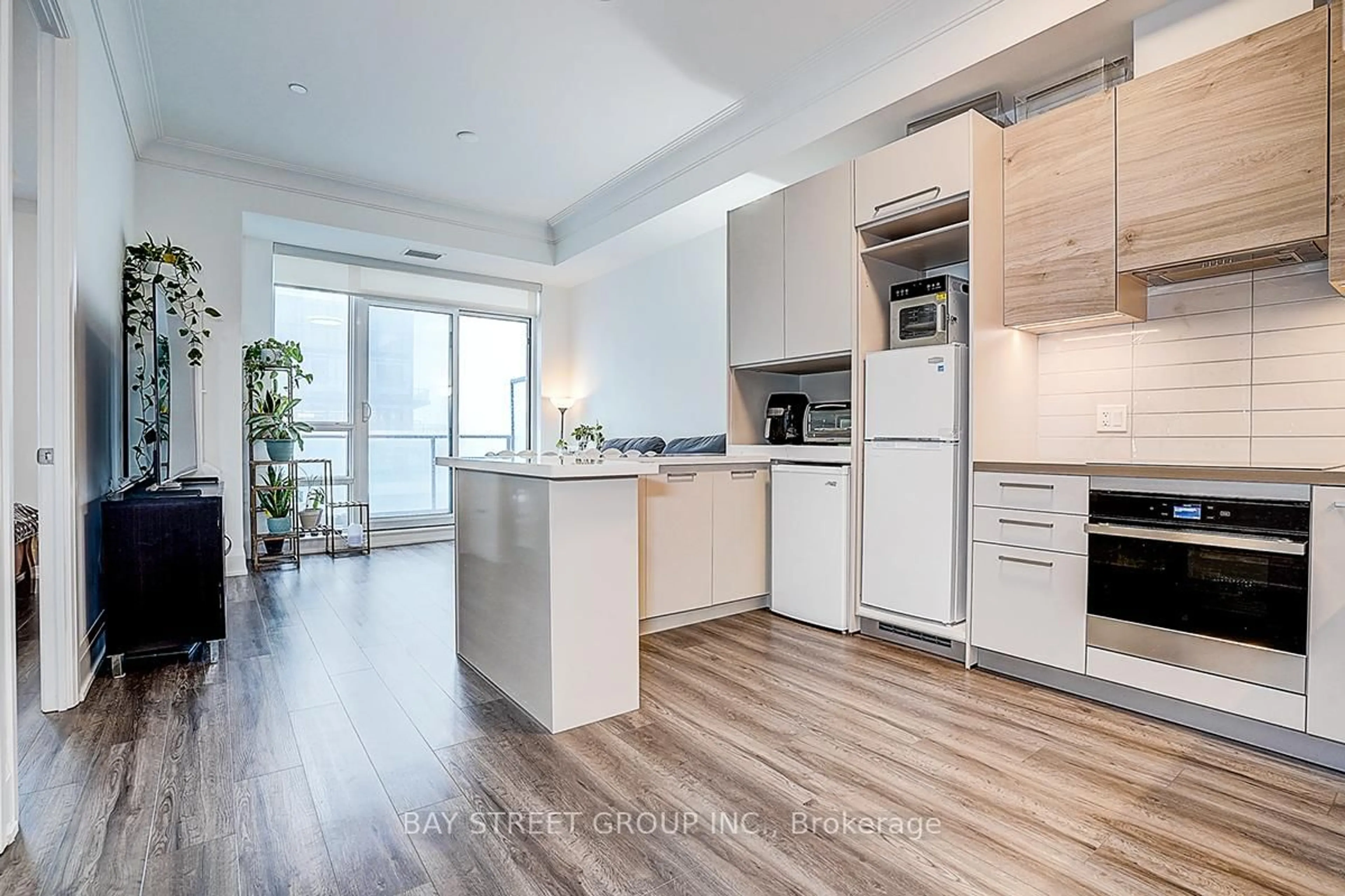 Open concept kitchen, wood/laminate floor for 12 Gandhi Lane #3703, Markham Ontario L3T 0G8
