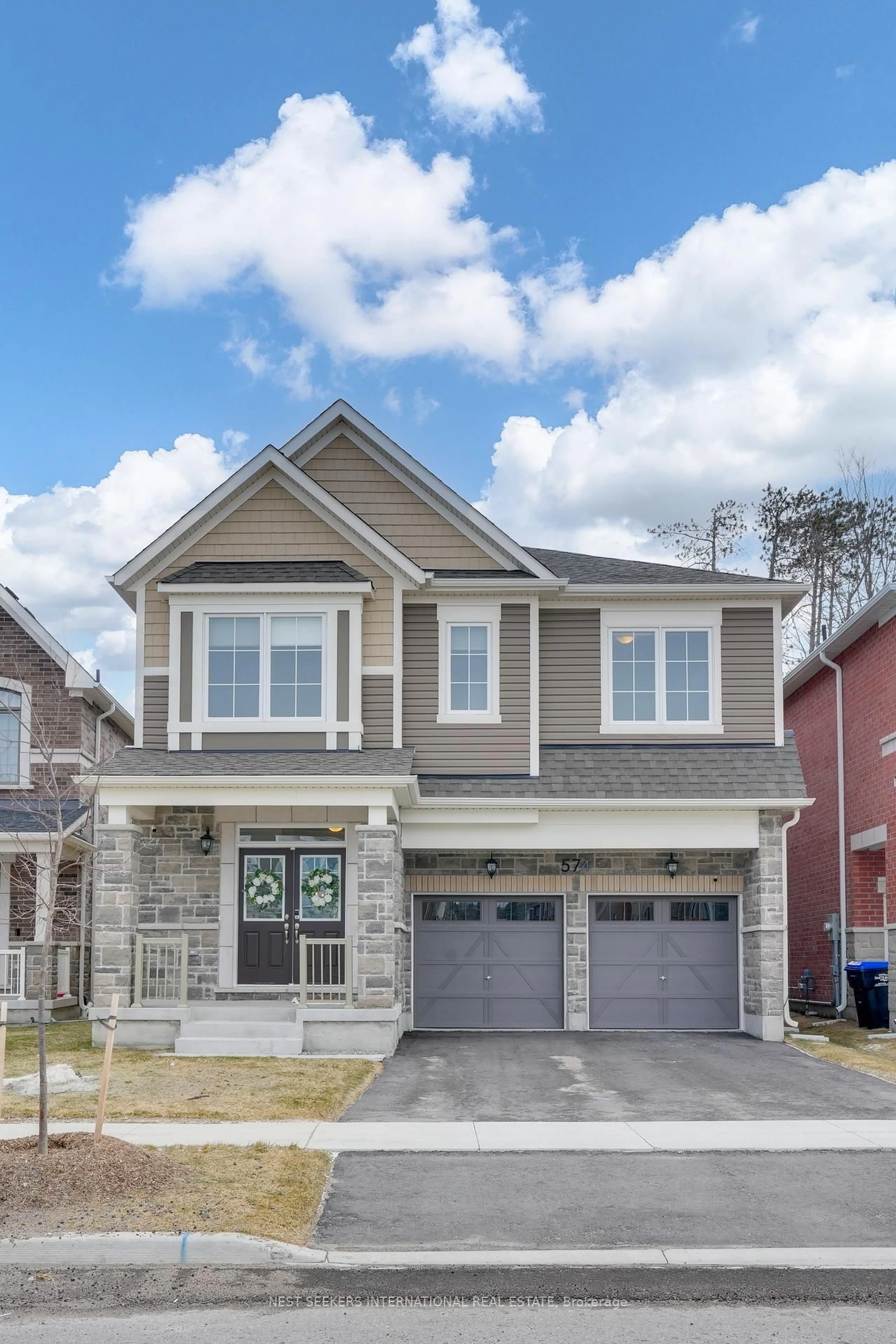 Home with brick exterior material, street for 574 Mika St, Innisfil Ontario L9S 2J6