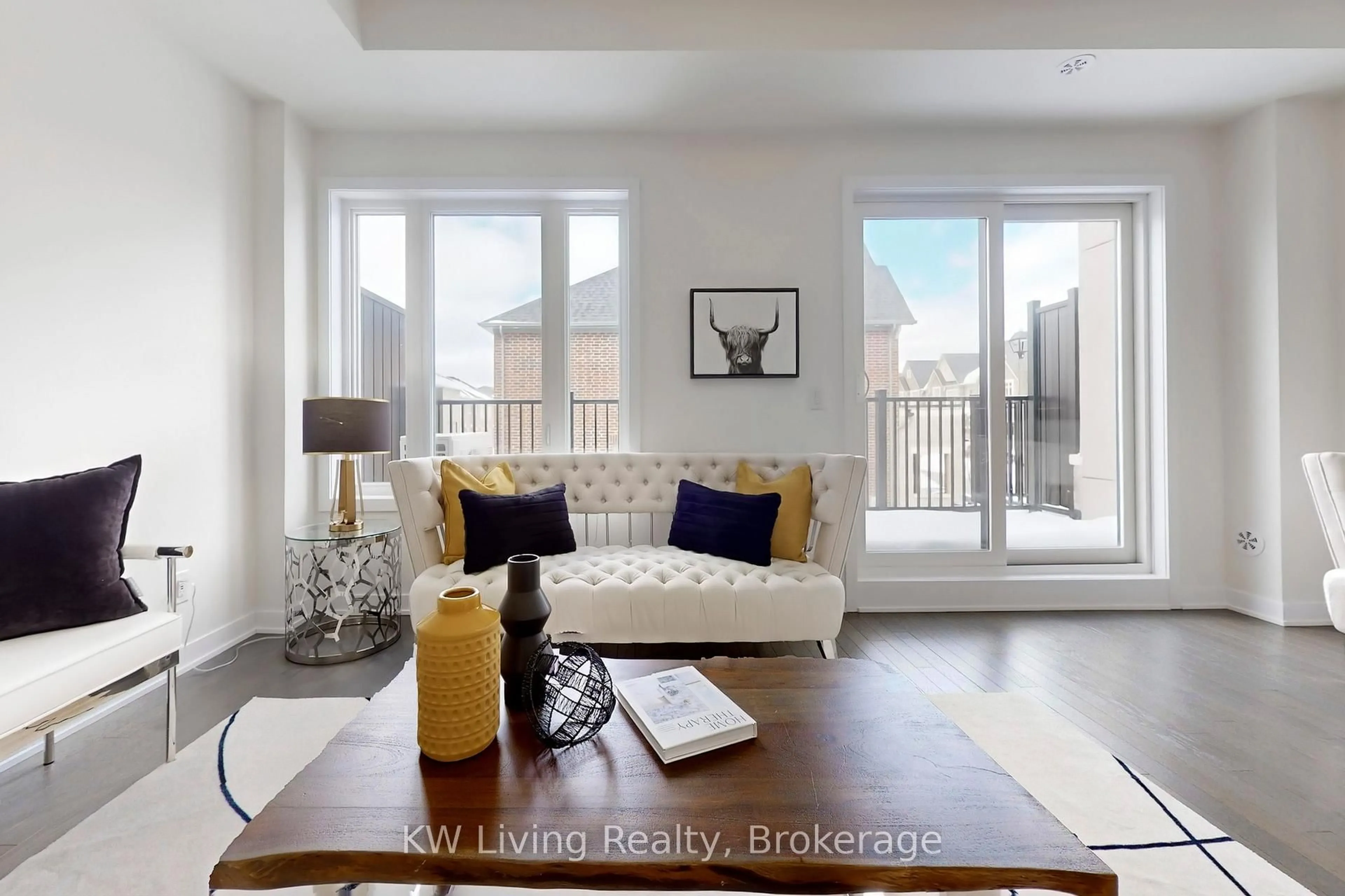 Living room with furniture, wood/laminate floor for 62 York Downs Blvd, Markham Ontario L6C 3K3