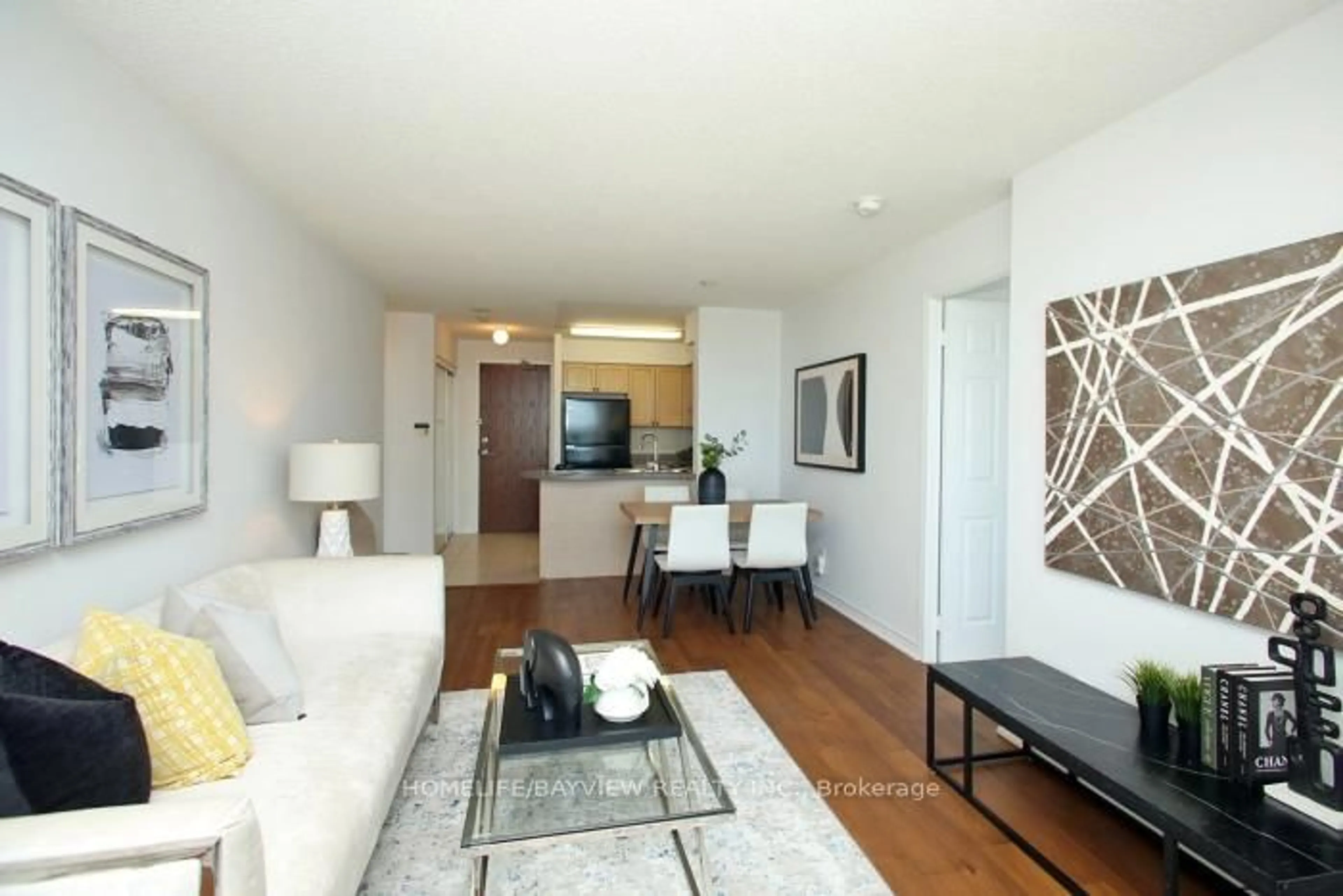 Living room with furniture, wood/laminate floor for 23 Oneida Cres #PH12, Richmond Hill Ontario L4B 0A2